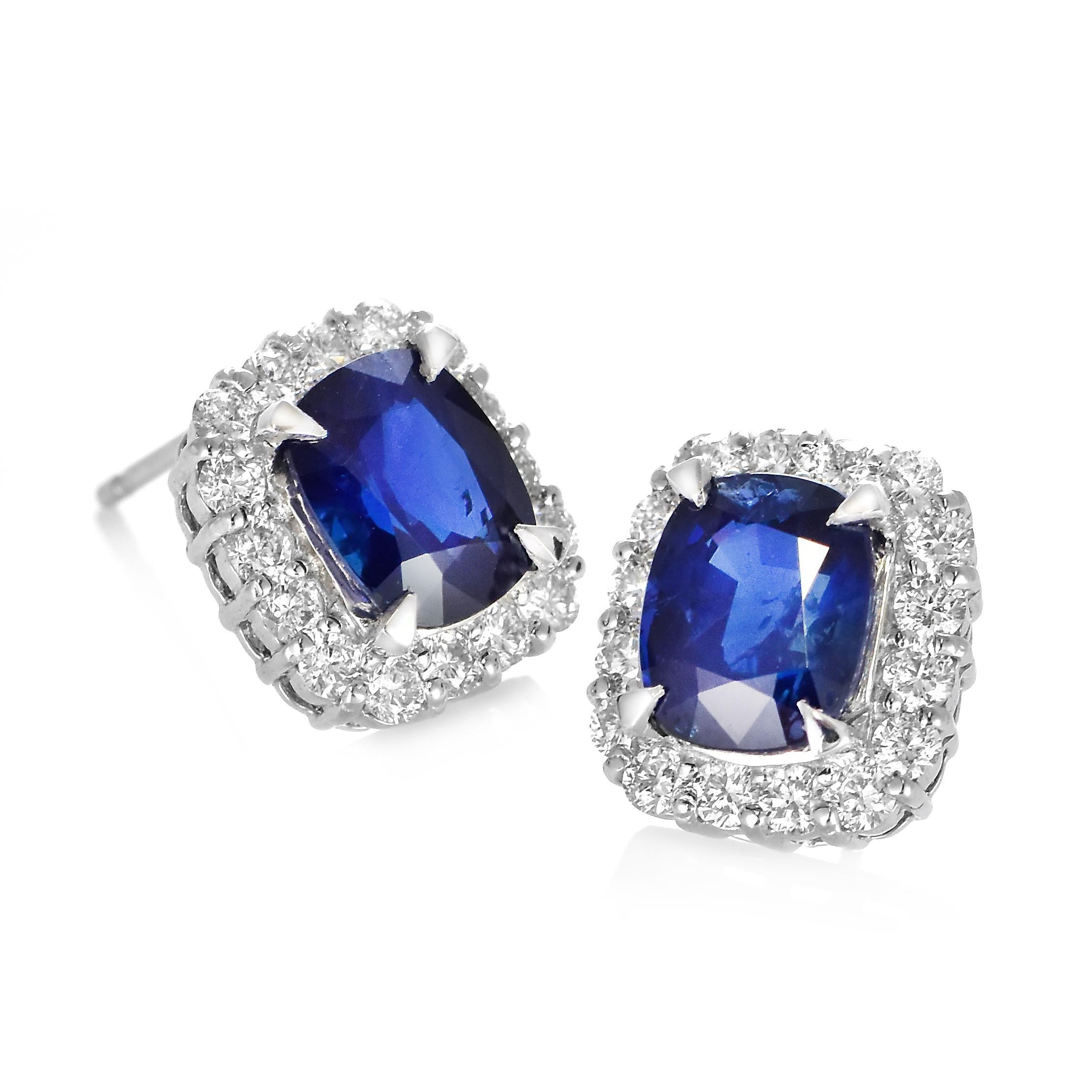 A beautiful pair of earrings featuring a total of 3.93 Carat Natural, Burmese, Royal Blue Sapphires and 0.96 Carats Diamond Accents made in Platinum. Sapphires have extraordinary durability - they excel in hardness as well as toughness and