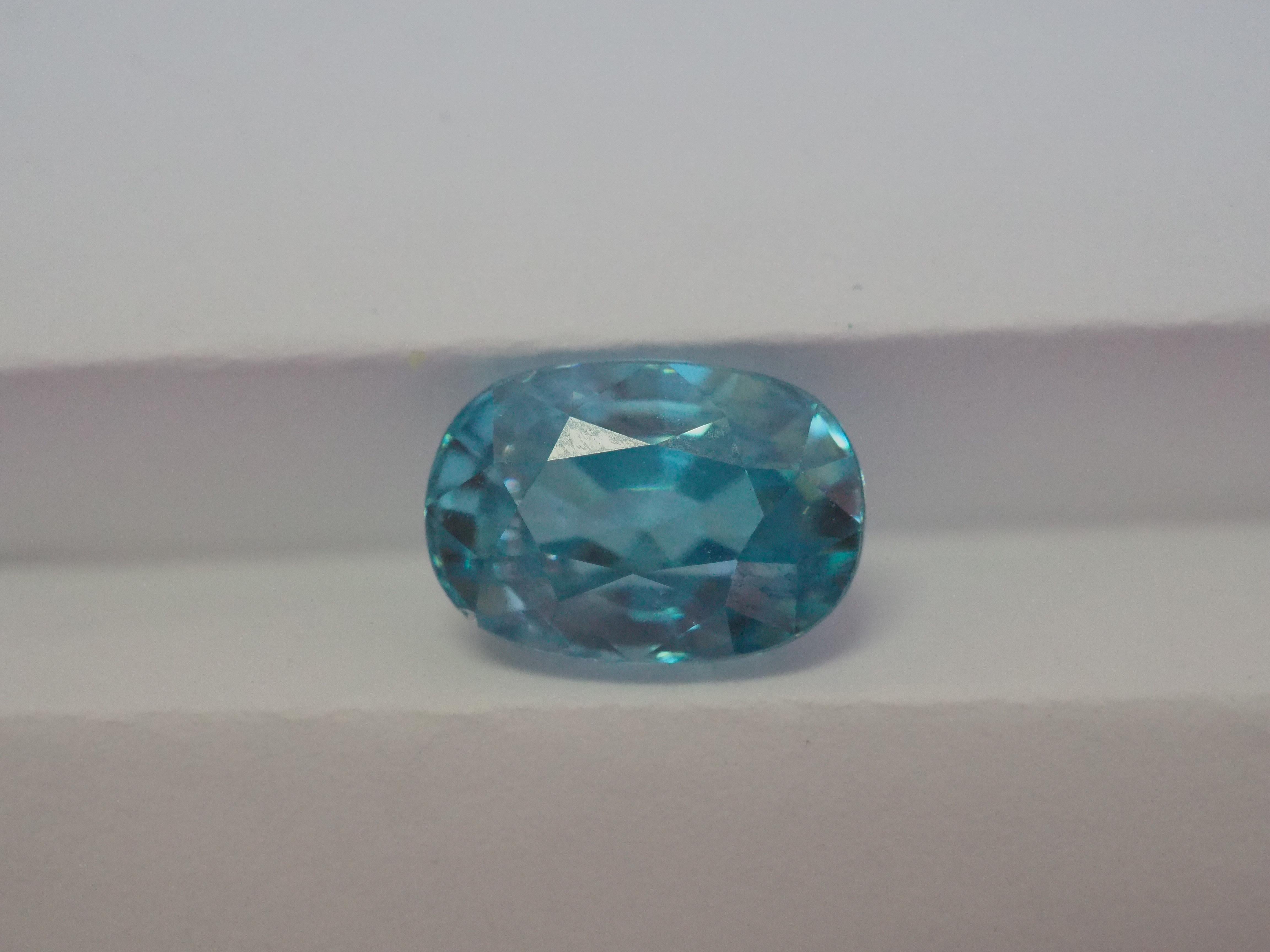 Eye clean.

This particular gem measures approximately 10.27x7.09x5.89 mm, providing ample space for intricate and creative jewelry designs. 

Sparkling blue color
Weight= 4.80 carats

The country of origin for this zircon is Cambodia

-Come with