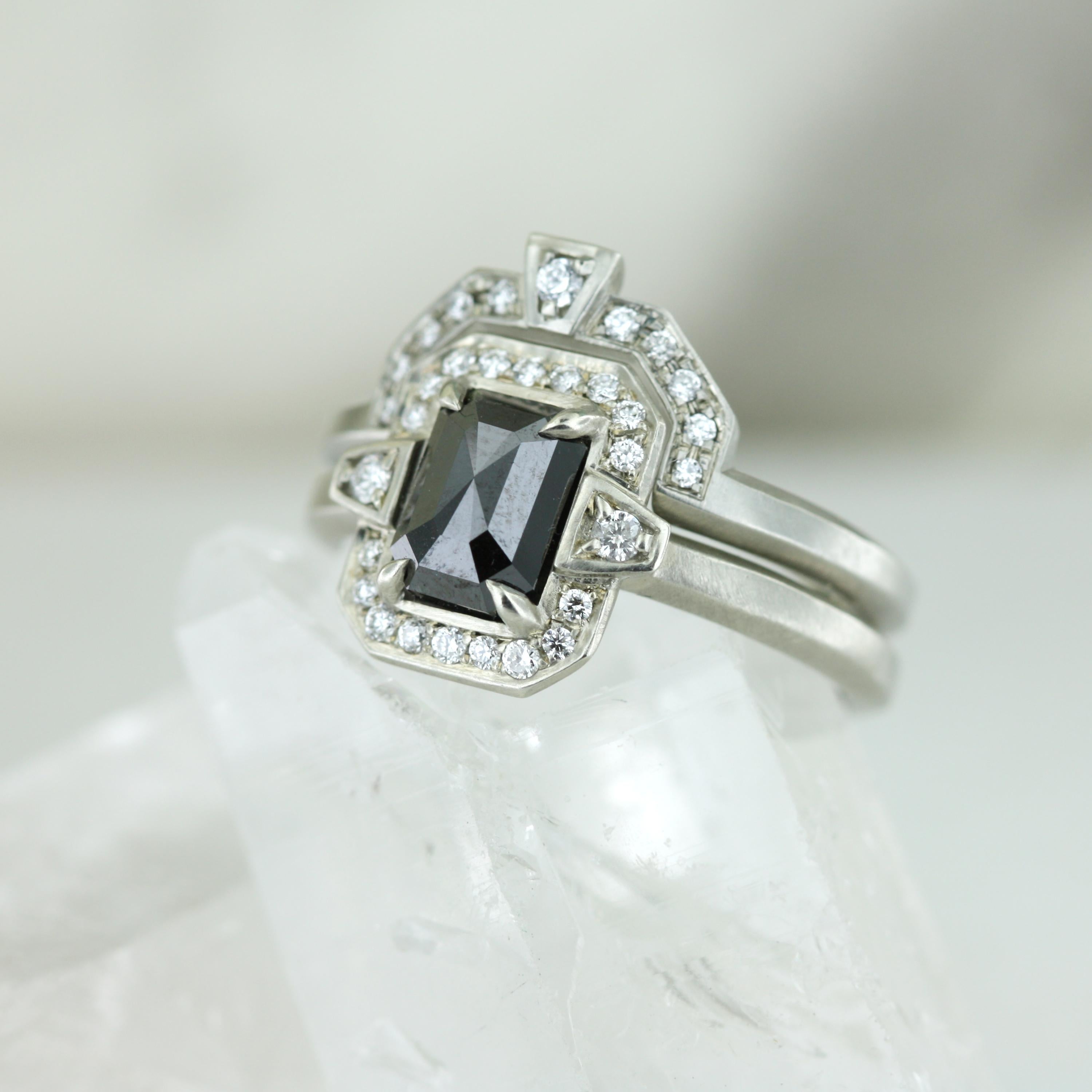 Modern edgy Art Deco inspired ring set. Over 1 carat of black and white diamonds glitter in this 14K white gold ring set. 

- Finger size 6
- Available for customization
- Appraisals included