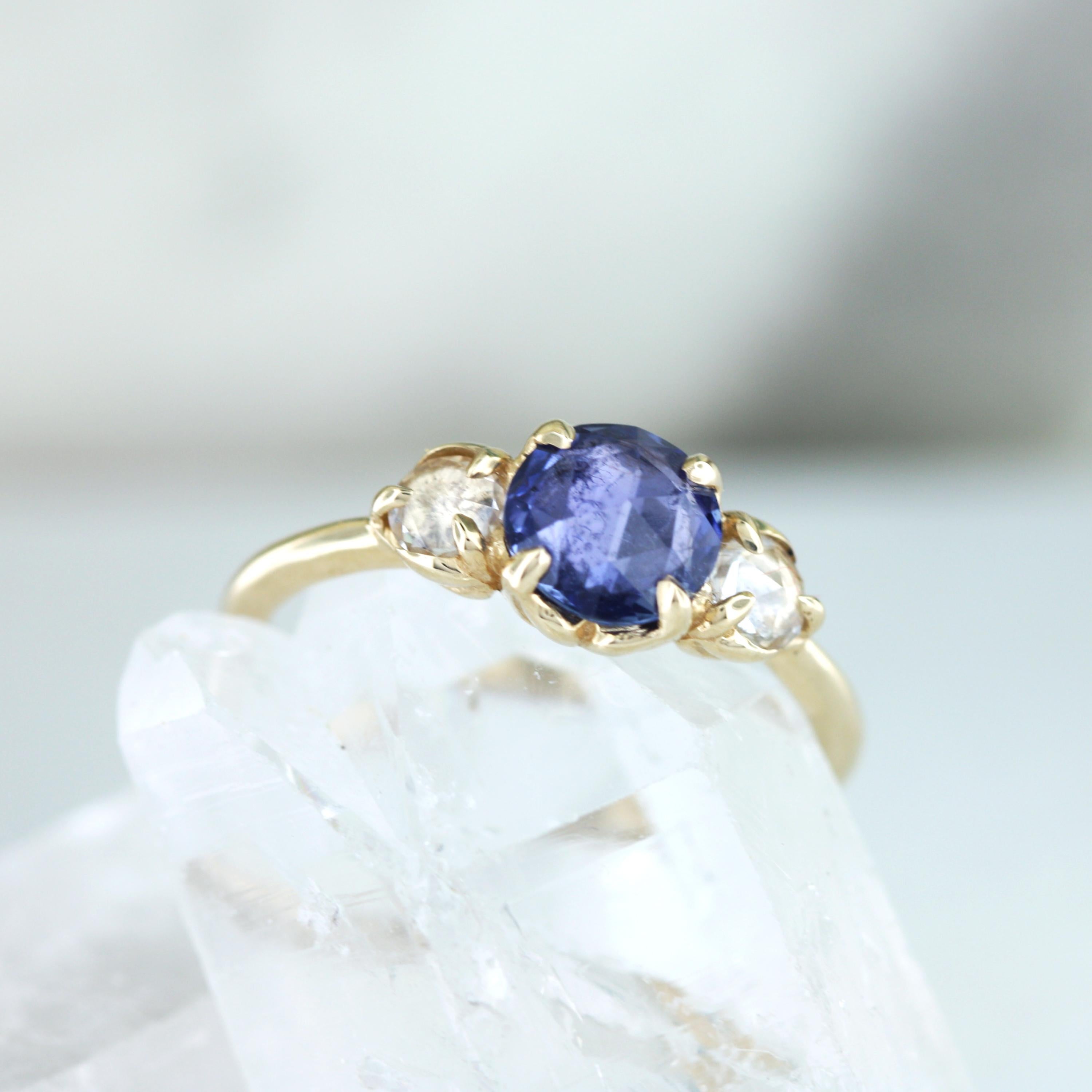 14K gold leaves curl up to hold these lovely rose cut sapphires, 1.2 carats in total. The glow and sheen on this ring is beautifully understated. 

- Finger size 6.25
- Available for customization
- Appraisals included