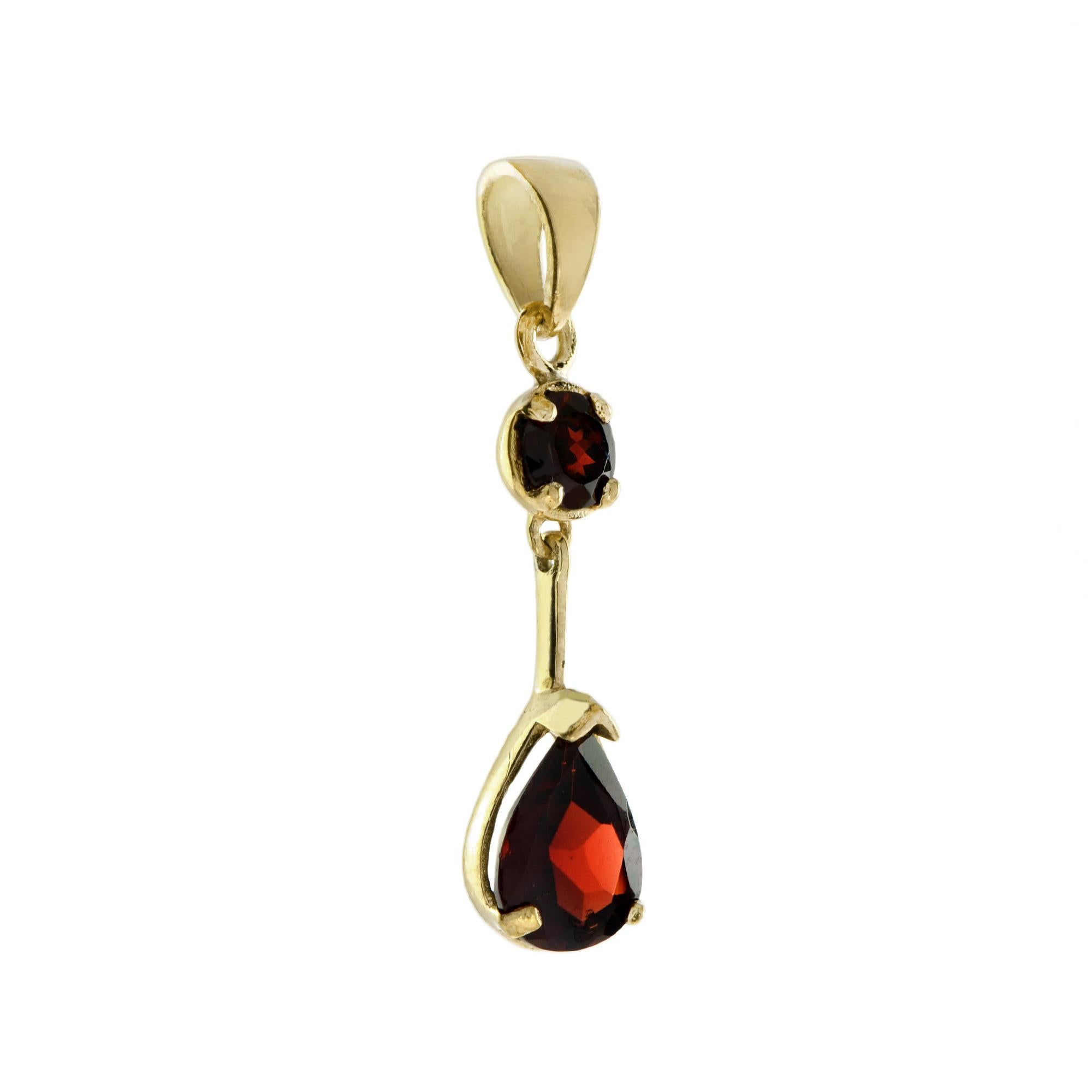 The pendant is a vintage design decorated with deep red pear shape garnet, set in a 14K yellow gold rub-over setting. 

Information
Style: Vintage
Metal: 14K Yellow Gold
Width: 6 mm.
Length: 27 mm.
Weight: 1 g. (approx. in total)

Gemstones 
Type: