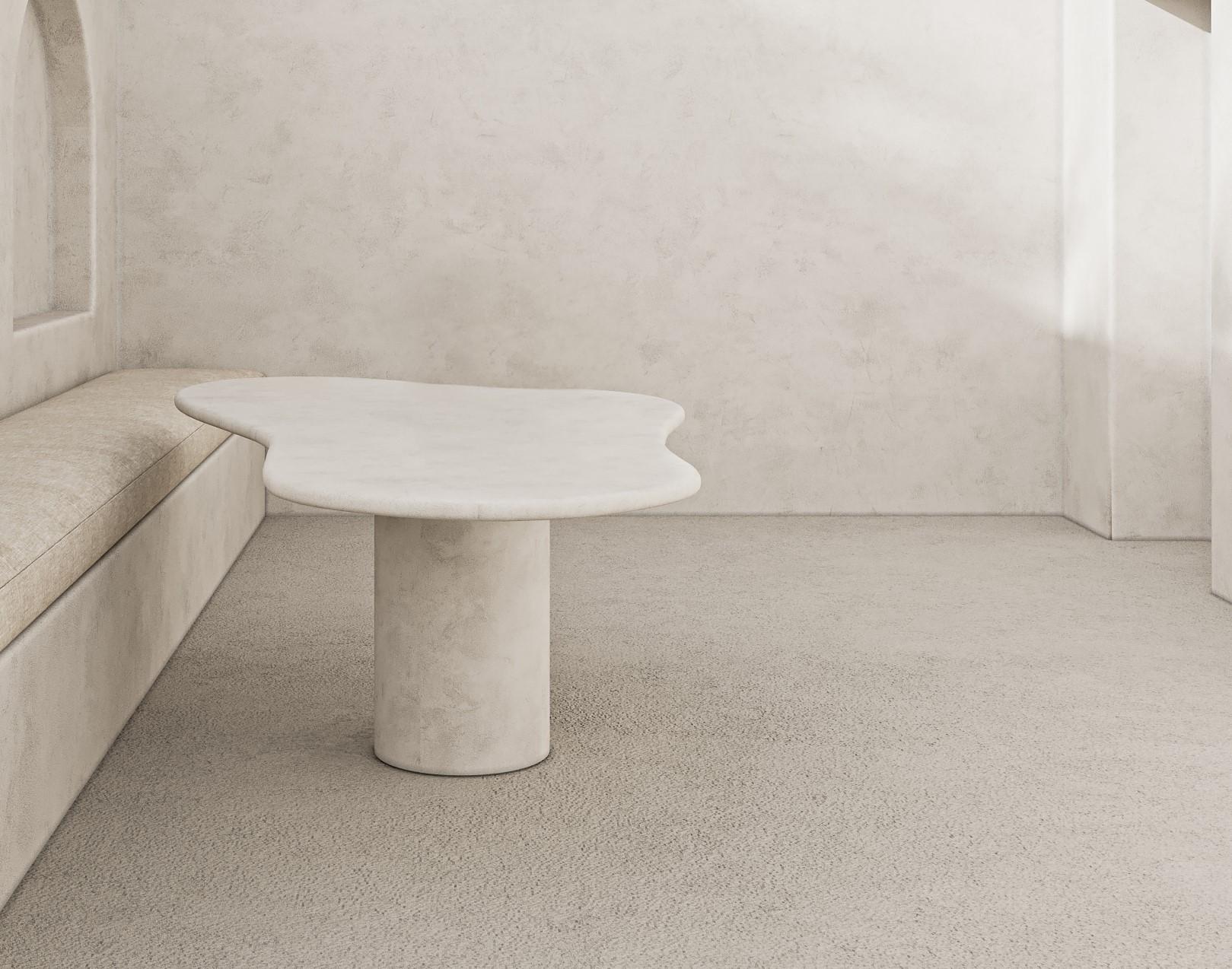 Aimi Dining Table by Kasanai
Dimensions: D 100 x W 200 x H 76 cm.
Materials: Lime plaster.
Also available in different dimensions and colors. Please contact us.

Aimi’s organic, free flowing shape is a real showpiece and a great focal point for any