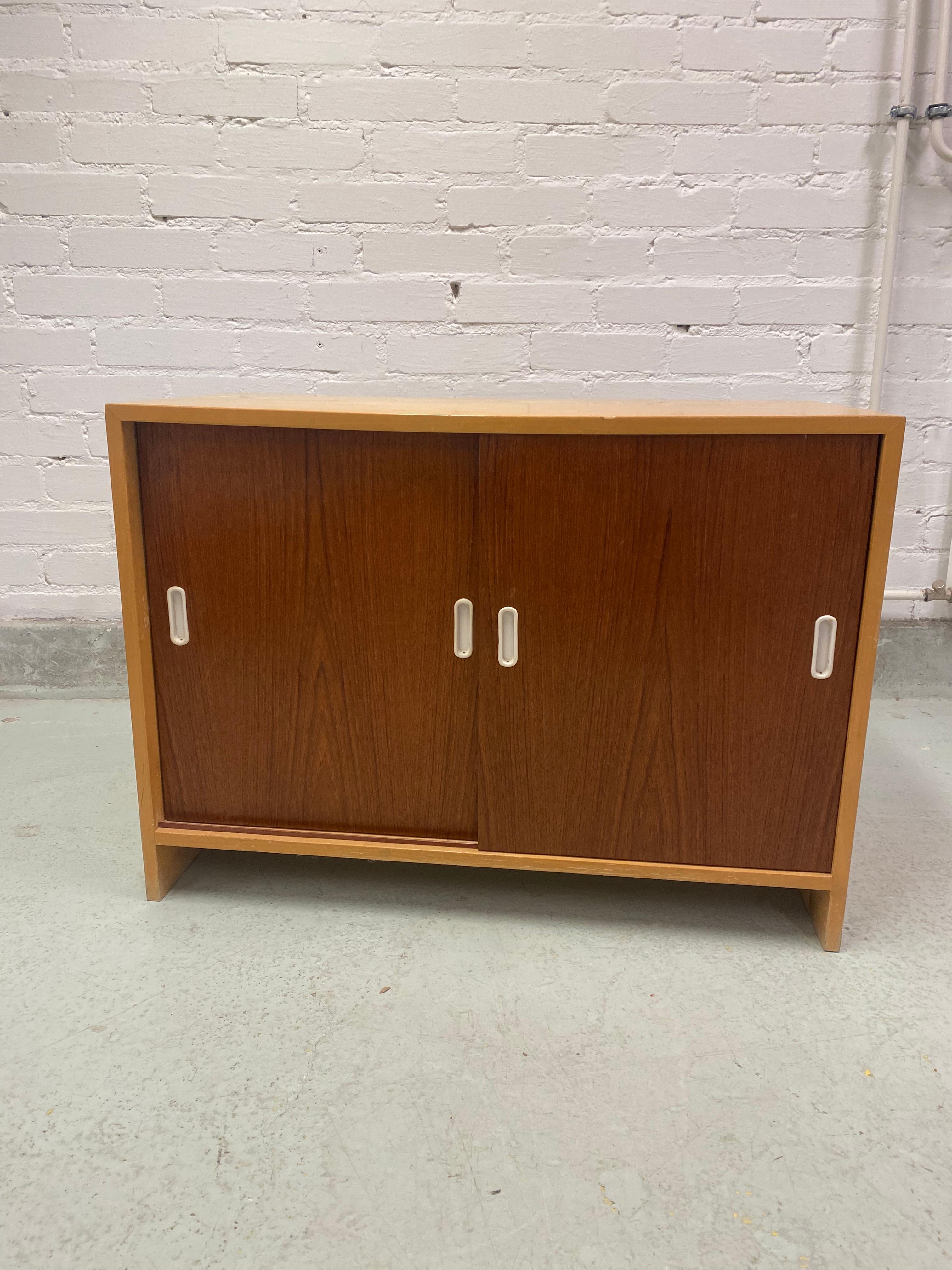 Aino Aalto cabinet model 217, manufactured by Oy Huonekalu-ja Rakennustyötehdas Ab in the 1950s. The outer part is birch and the doors are teak, which the Aaltos did every now and then with their furnitures. The cabinet is in great condition with a