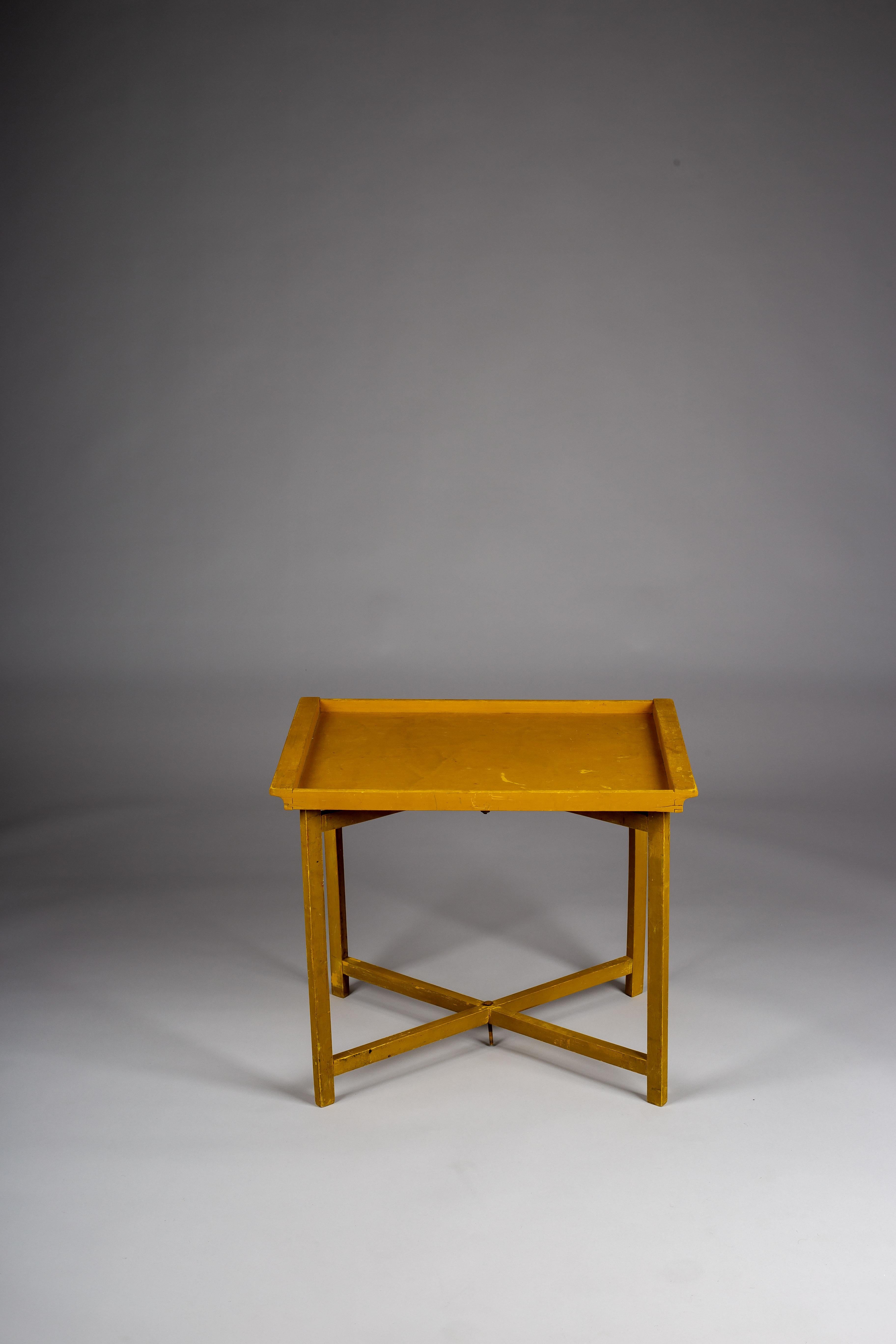 This unique Aino Aalto foldable tray table is a rare find from the 1930s, and is sure to be a focal point in any vintage furniture collection. Made by A. Ahlström Oy, this piece is a true testament to the innovative and functional design philosophy