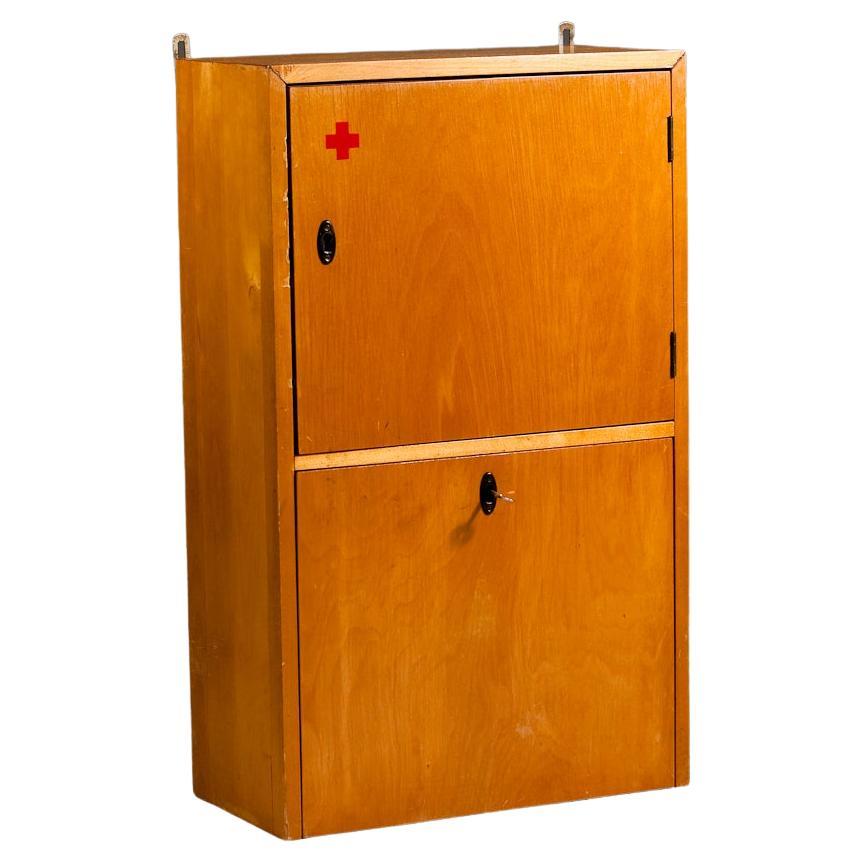 A very rare piece of furniture by Aino Aalto. Medicine cabinets were made since 1930's by Artek to fill the demand for modern hospitals and care centers, like Paimio Sanatorium in Finland, which was designed by the architect Alvar Aalto.

The