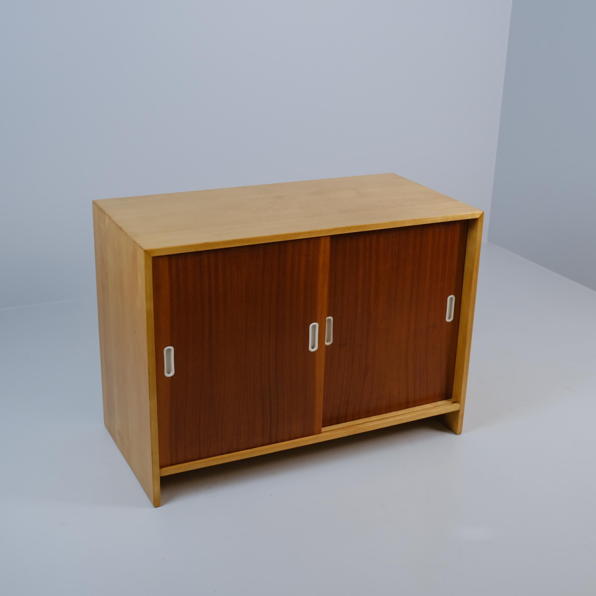Aino Aalto cabinet model 217, manufactured by Oy Huonekalu-ja Rakennustyötehdas Ab in the 1950s. The outer part is birch and the doors are teak, which the Aaltos did every now and then with their furnitures. The cabinet is in great condition with a