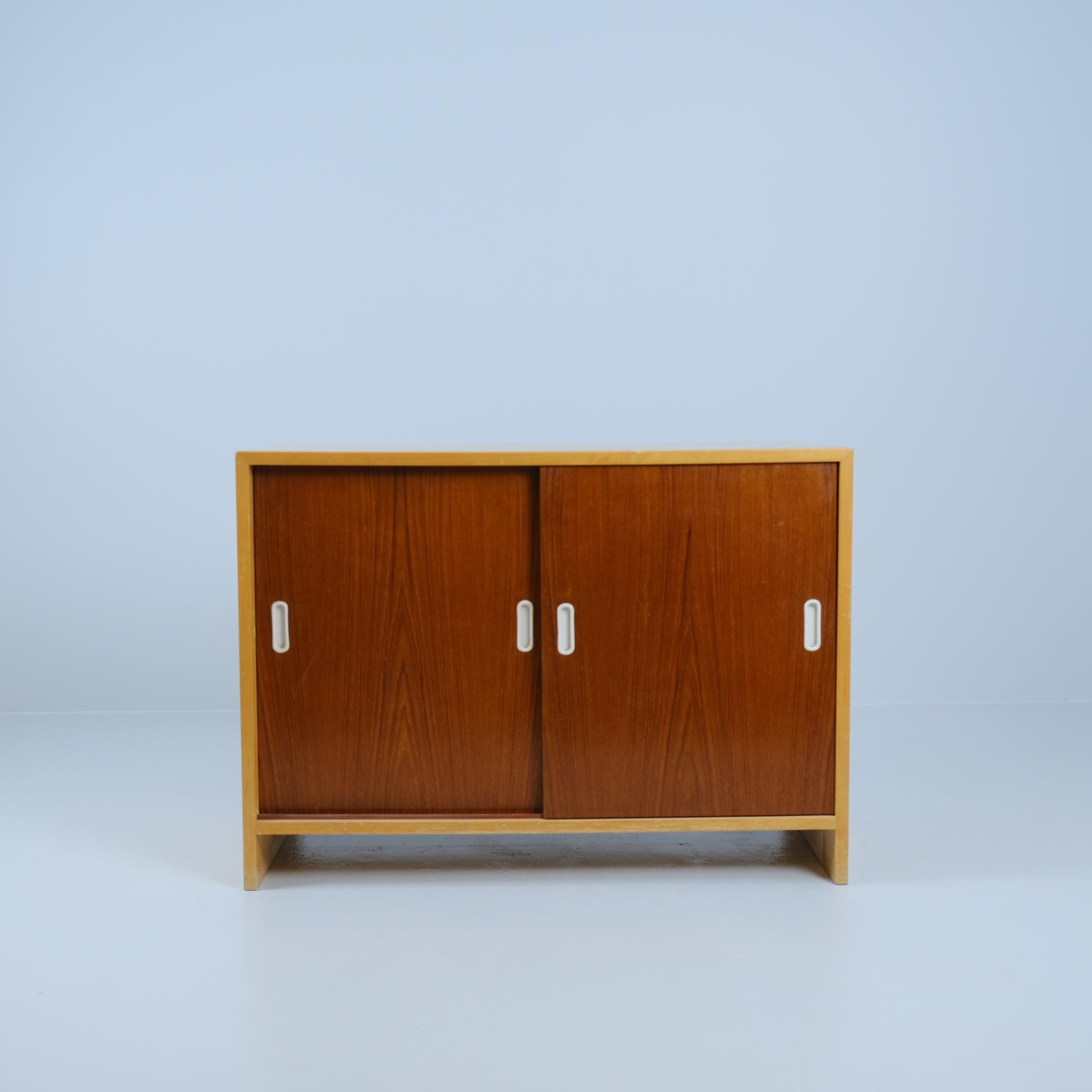 Aino Aalto cabinet model 217, manufactured by Oy Huonekalu-ja Rakennustyötehdas Ab in the 1950s. The outer part is birch and the doors are teak, which the Aaltos did every now and then with their furnitures. The cabinet is in great condition with a