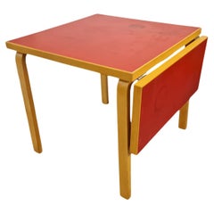 Aino & Alvar Aalto Mesa de cocina plegable de linóleo rojo, Artek Años 50