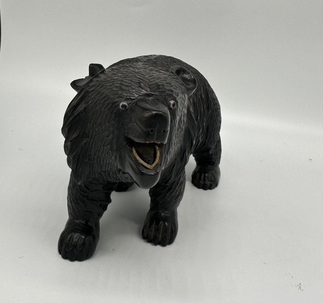 Early 20th Century Ainun Black Bear Hand Carved Wood Sculpture with Glass Eyes For Sale