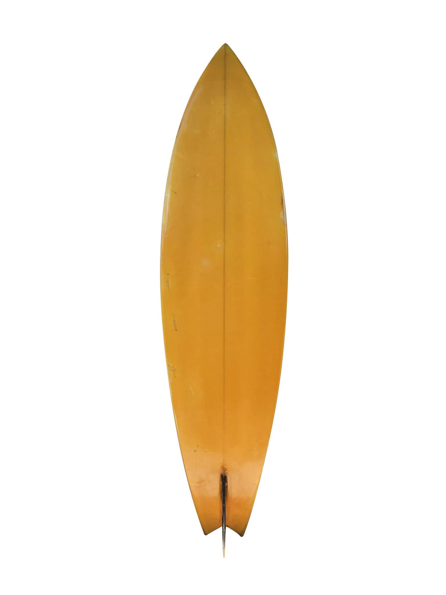 This 6’3 Aipa Wave Crest swallow tail from the mid-1970s is a striking showcase of Ben Aipa’s groundbreaking design vision. Celebrated for his innovative shaping and lasting impact on performance surfing, Aipa’s boards from this period remain among