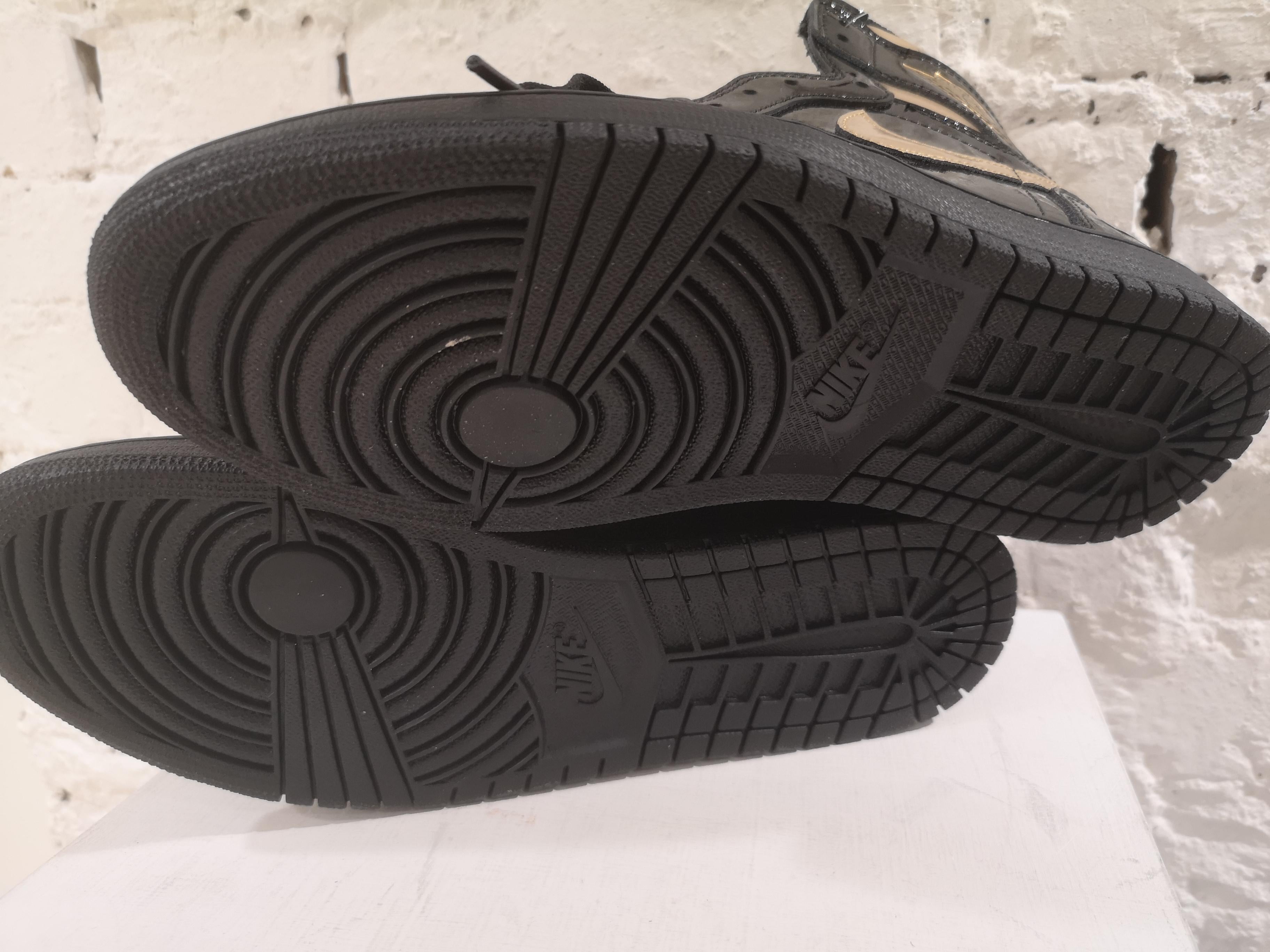 Black Air Jordan 1 High black metallic gold patent leather sneakers