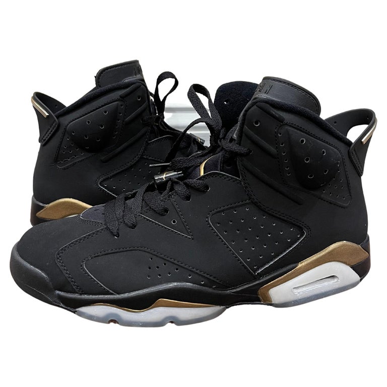 jordans 6 gold and black