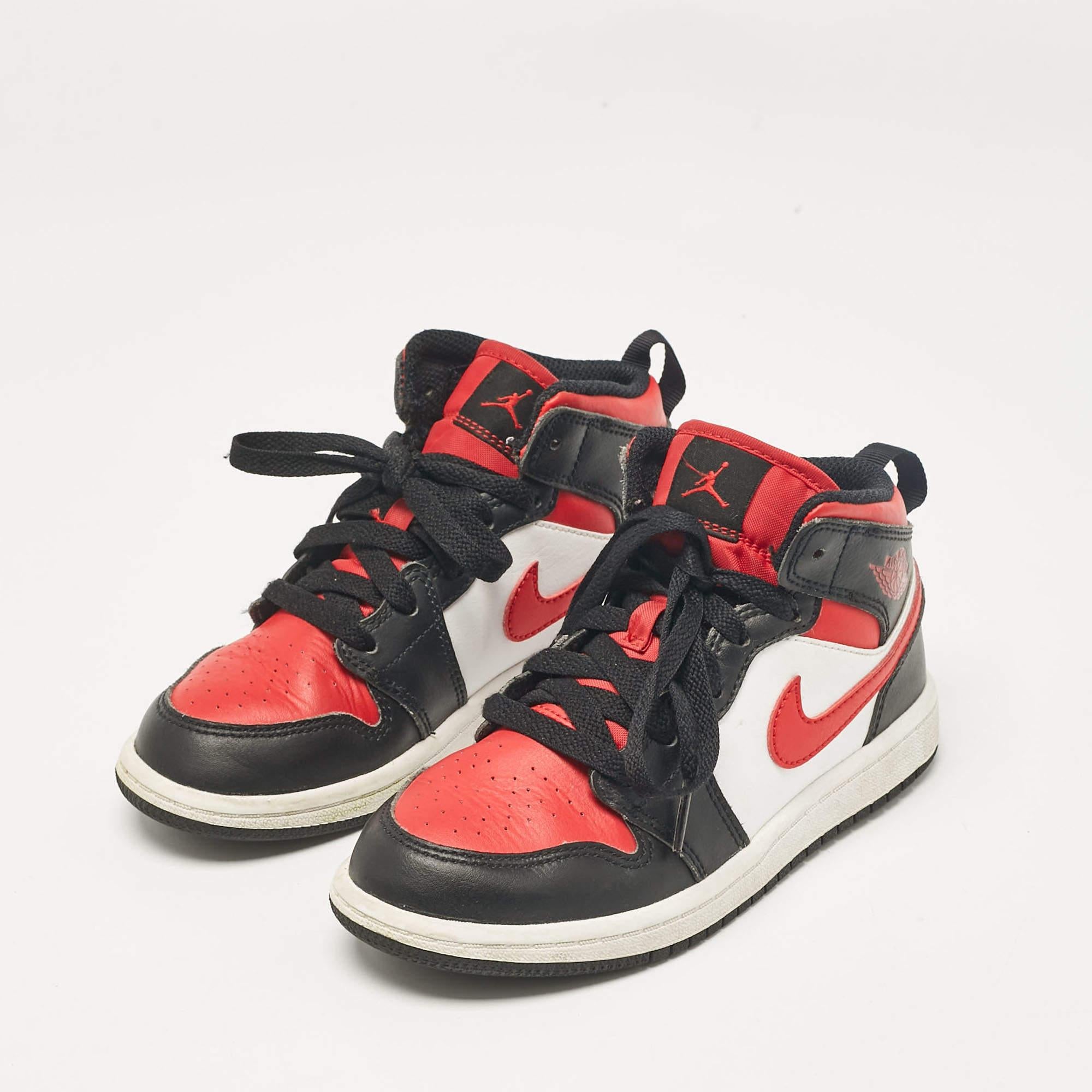 Sewn with care these Air Jordans for kids are perfect for all day wear. They come in the classic red white black colorway.