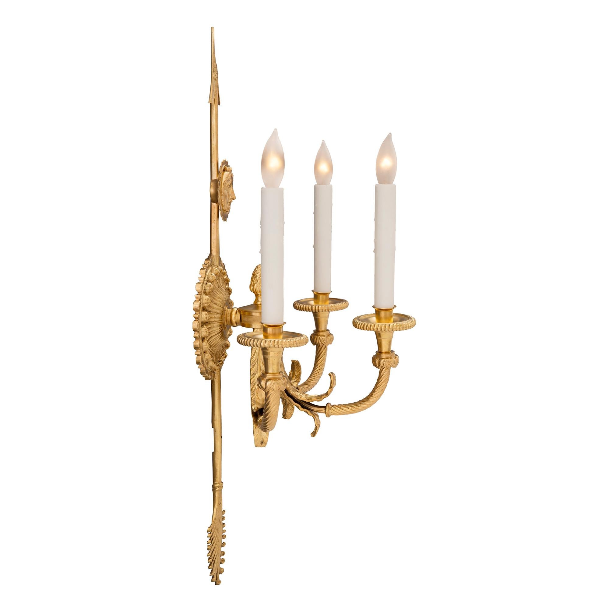 Neoclassical Pair of French 19th Century Neo-Classical St. Ormolu Three Arm Sconces For Sale