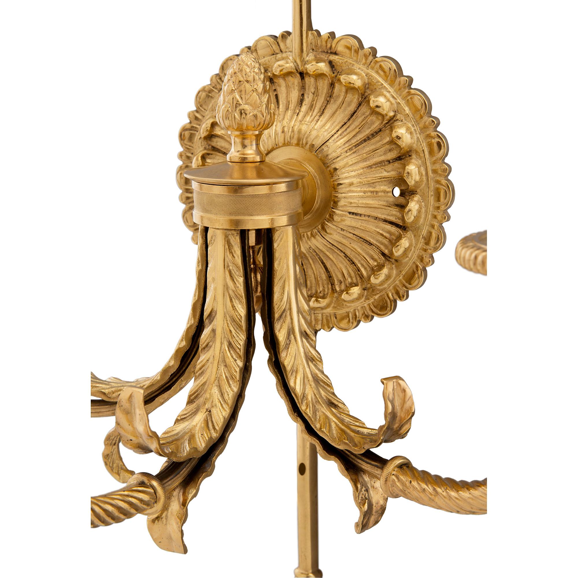 Pair of French 19th Century Neo-Classical St. Ormolu Three Arm Sconces For Sale 1
