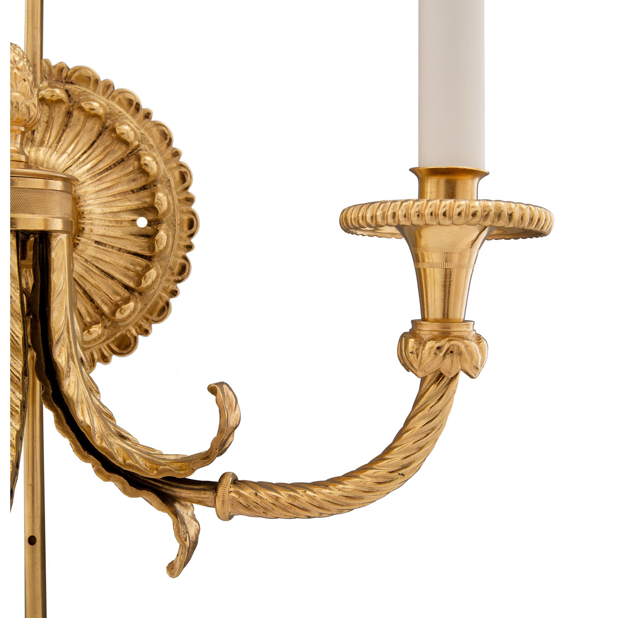 Pair of French 19th Century Neo-Classical St. Ormolu Three Arm Sconces For Sale 2