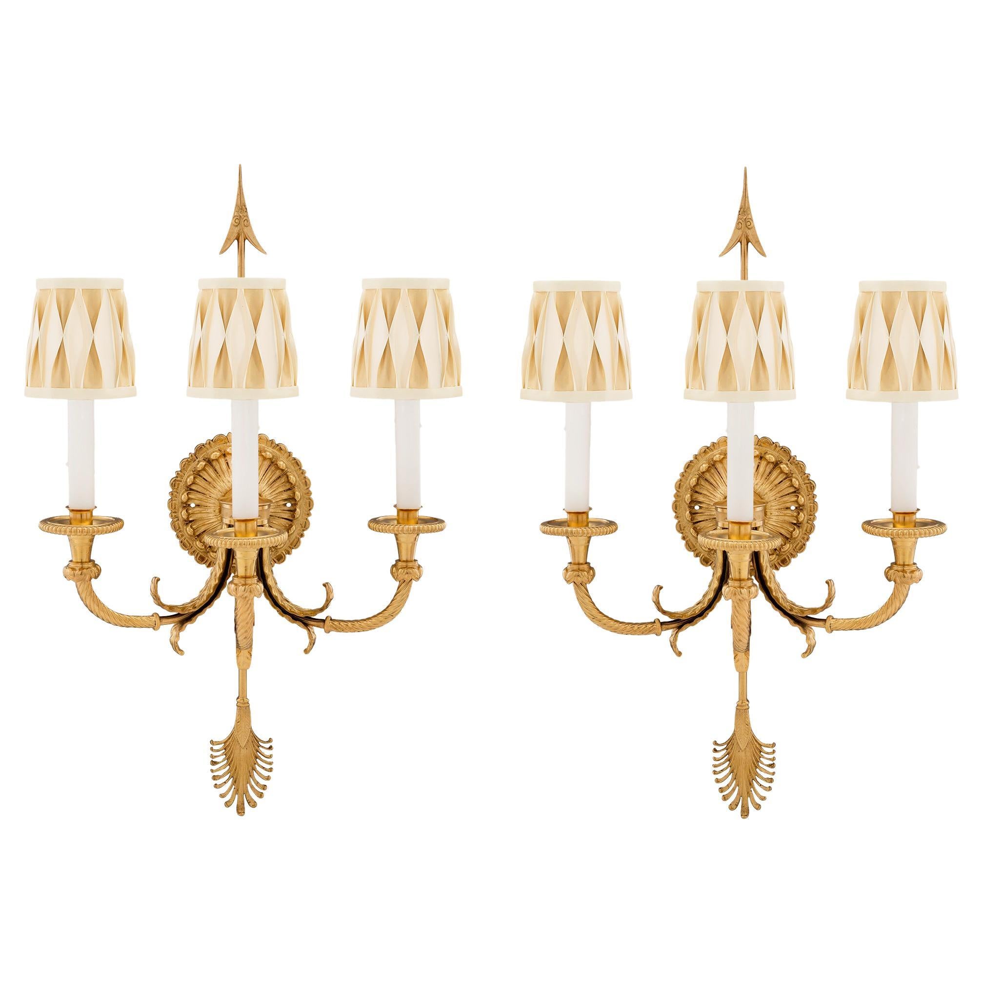 Pair of French 19th Century Neo-Classical St. Ormolu Three Arm Sconces For Sale