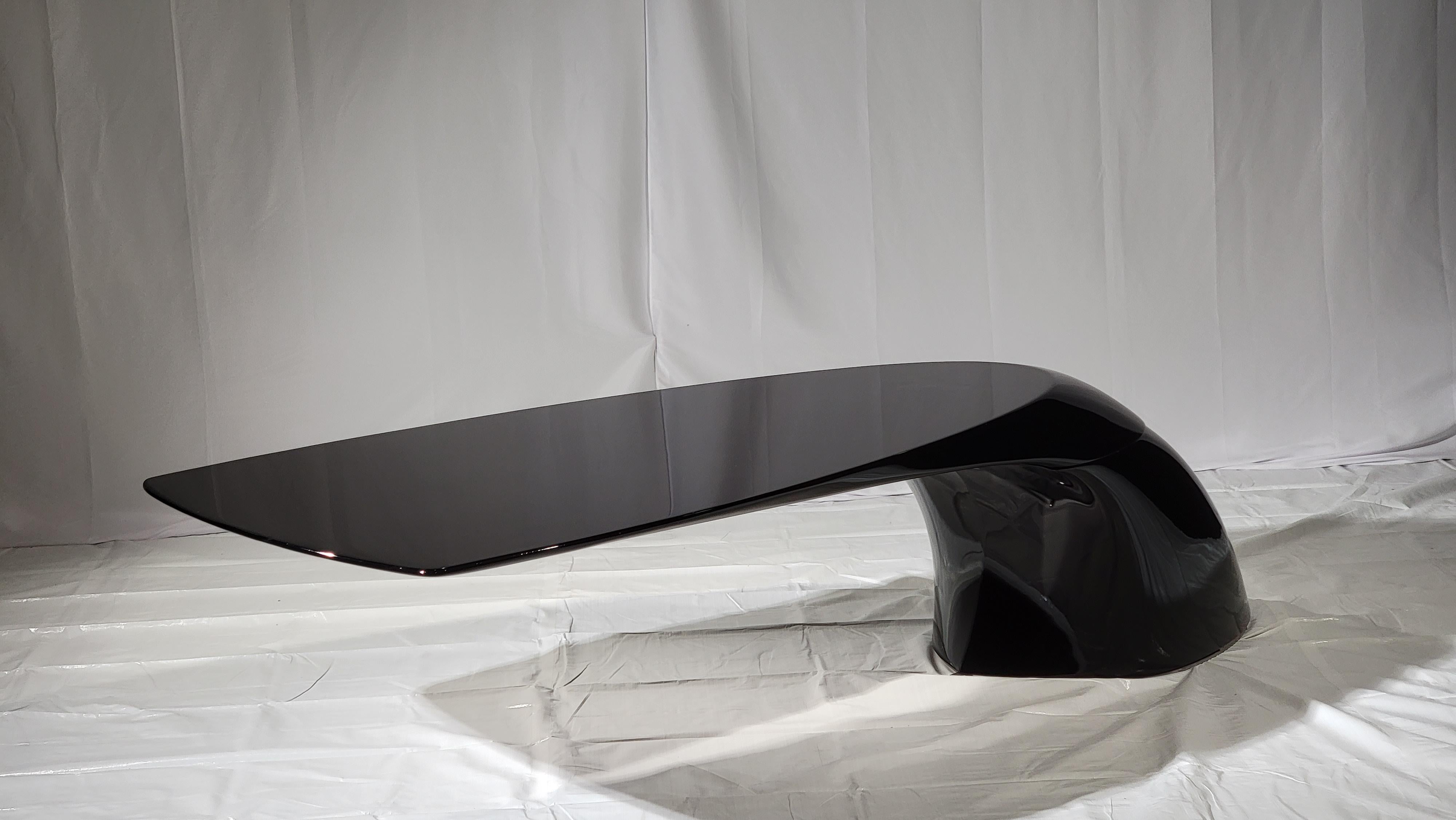 Air T1 Table by Sebastien Rastouil Studio
Dimensions: W 303.7 x D 126.4 x H 75 cm.
Materials: Metal, Wood, Carbon Fiber.
Weight: 440 Kg.

The Air T1 table draws its inspiration from the sea, with contours that capture the elusive energy of an