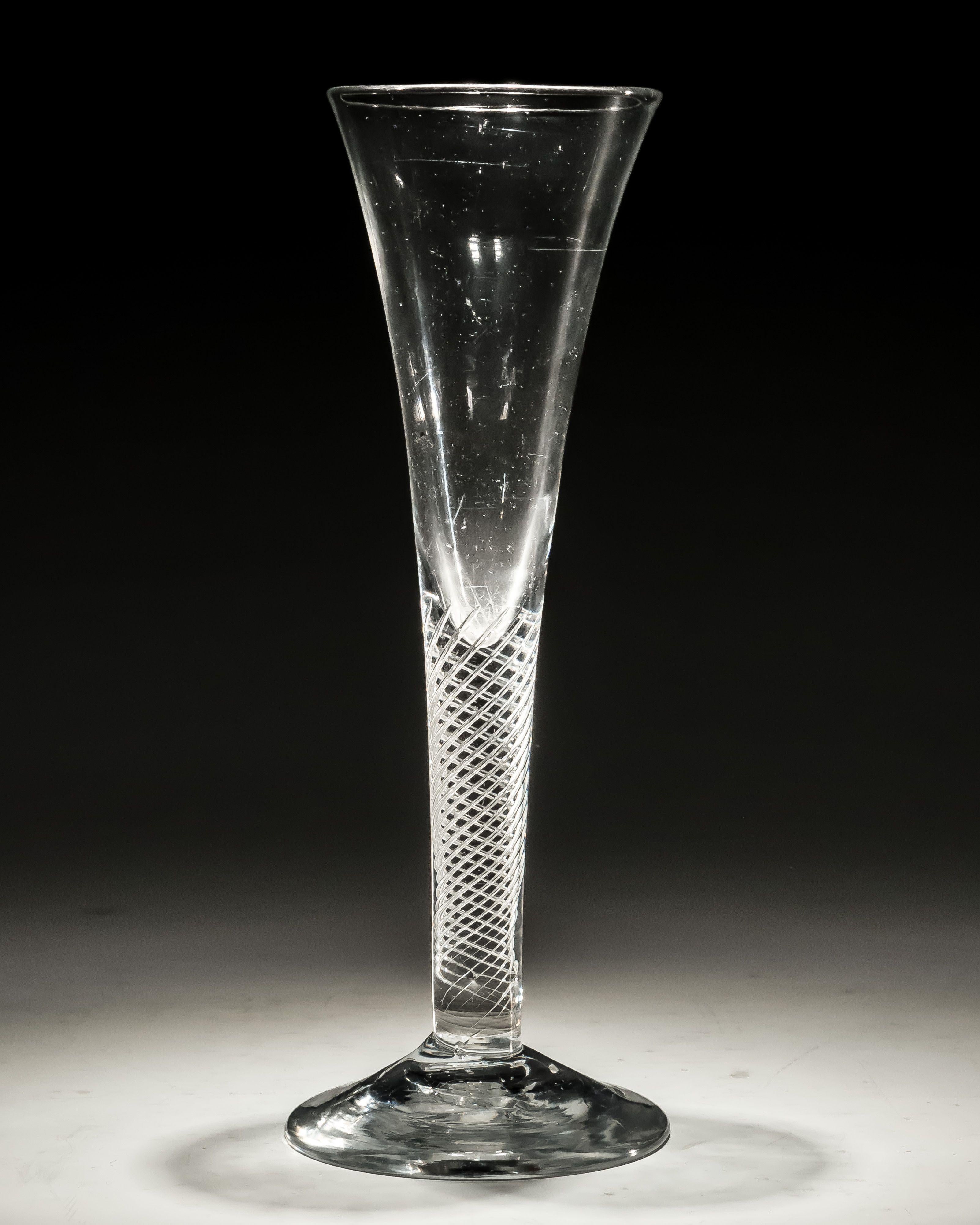 An air twist ale glass. England, circa 1760.

Measures: Height: 19 cm (7 1/2