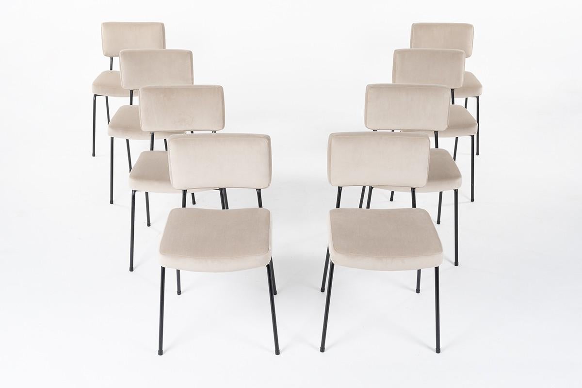 Set of 8 airborne chairs, produced in the 1950s. Composed of a tubular black metal structure and foam covered in brown velvet. 
One chair has the original label of airborne on the metal structure.