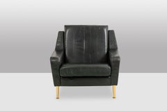 Airborne. Pair of green leather armchairs. 1950s.