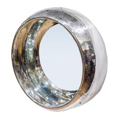 Aircraft cowling from a WWII Bristol Hercules radial engine mounted as a mirror