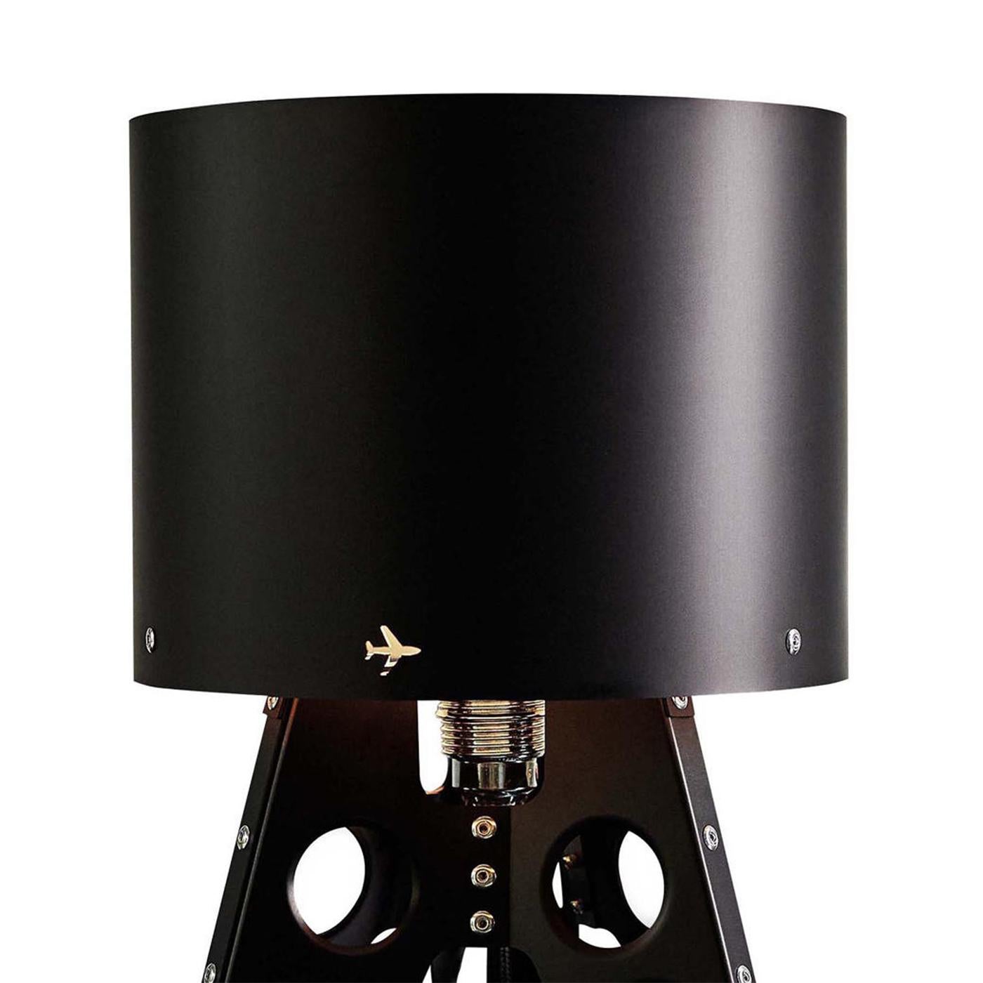 Table lamp aircraft with structure and shade
in powder-coated aluminium in black finish.
With 41 rivets hand setted. With 1 bulb, lamp
holder type E14, max 40 watts. Bulb not included.
Also available in white finish.