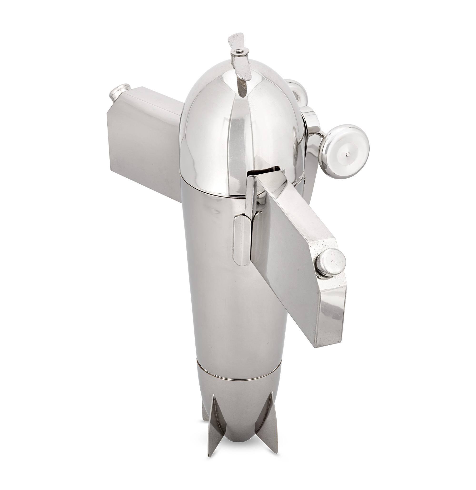 Airplane Cocktail Shaker Set
J.A. Henckels
Circa 1928

This extraordinary airplane-shaped cocktail set, crafted circa 1928, represents the golden age of travel and the Art Deco fascination with flight. Designed with remarkable ingenuity, the sleek