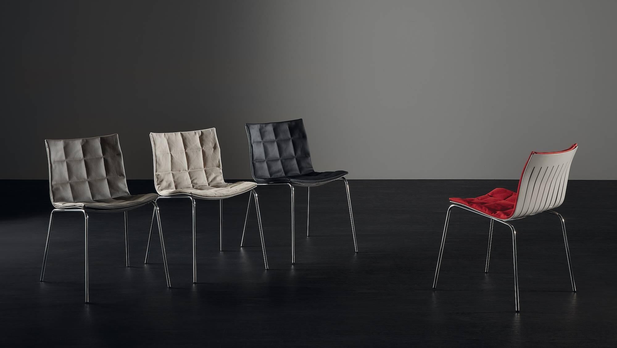 A soft, continual line which gives a comfortable, ergonomic seat with a matching, extremely light base. Airy is a chair with a sinuous, comfortable shape, made with a lightweight molded aluminum shell and soft cushions with quilted stitching. The