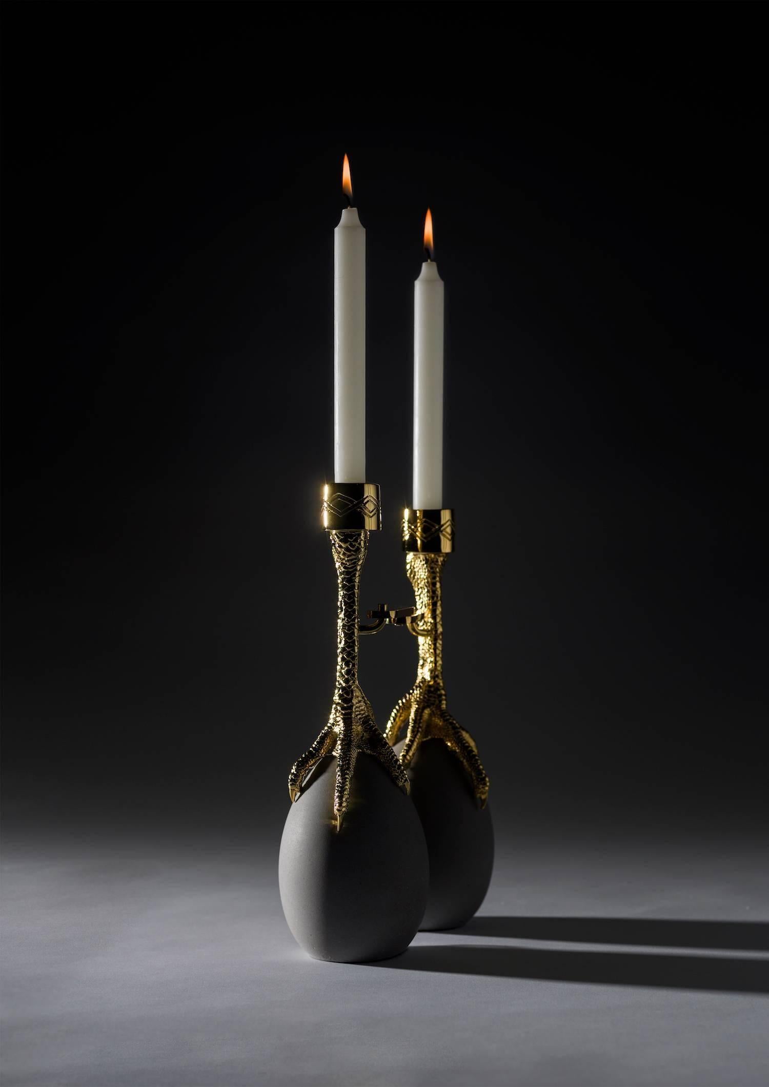 Walking hen candleholder by Aisha Al Sowaidi for BD Art Editions
 
Limited edition of eight units and two artist proofs and two prototypes.

Claws in cast brass and hinges in steel - both in a 24-carat gold-plated finish. Eggs are in concrete.
