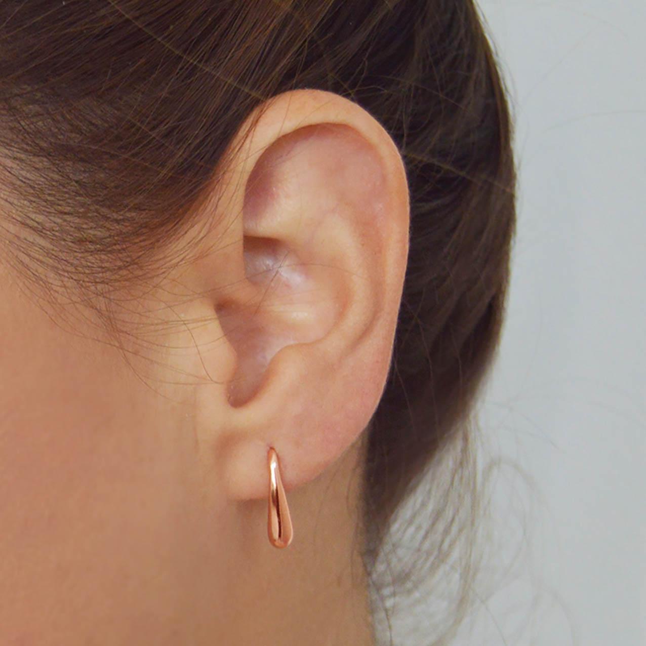 Reminiscent of a solitary raindrop in Amsterdam. These Jullie drop earrings capture women of Amsterdam in their daily lives.

- Rose gold plated sterling silver
- Earring size 15mm long

Caring for your jewelry
This design is crafted in 18K gold