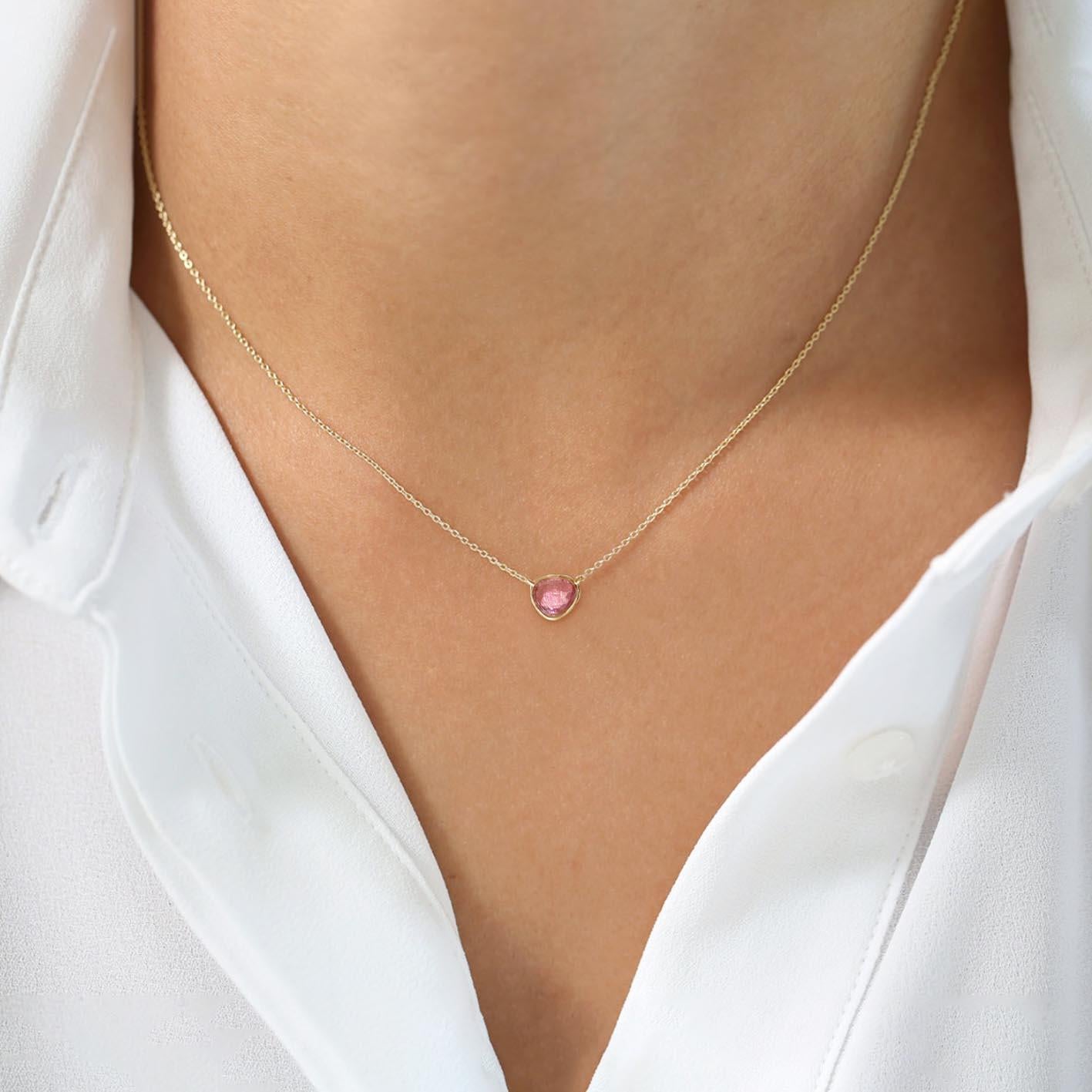 God created our skin tone in beautiful variety, and our souls are the same color. The Love More necklace is a visual statement about the personal bond.

- 18K gold
- Natural cerise pink sapphire
- Rose-cut sapphire, carat total weight 0.68
-