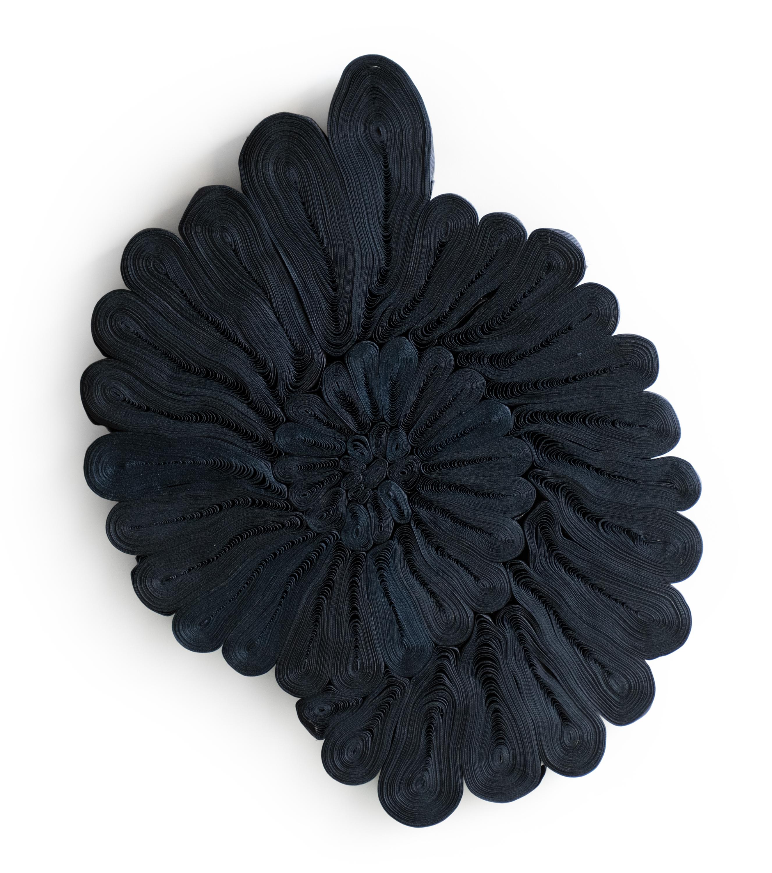 Contemporary textile artist, Aiveen Daly has launched her debut series of personal work ‘Coralation’ inspired by oceanic life. These unique ribbon sculptures are meditative, delicate artworks painstakingly hand pleated and manipulated using FSC