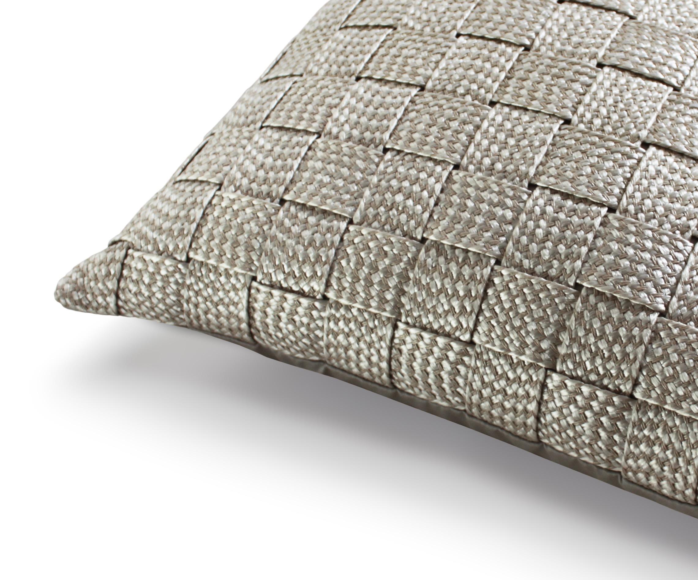 This beautiful raffia cushion is hand woven in our London studio and can be custom made to a larger or smaller size. There is a lustre to the raffia and the cushion is backed with the finest Italian cotton sateen. 

Shown here in a luxurious pearl