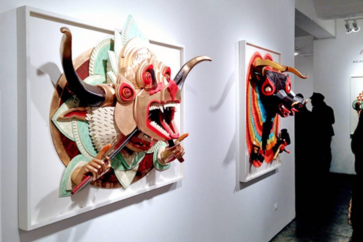 AJ Fosik is an American artist who creates intricate, vividly colored three-dimensional pieces that reference folk art, taxidermy, and cultural rituals. Using hundreds of pieces of wood and found materials, he creates figurative and intricately