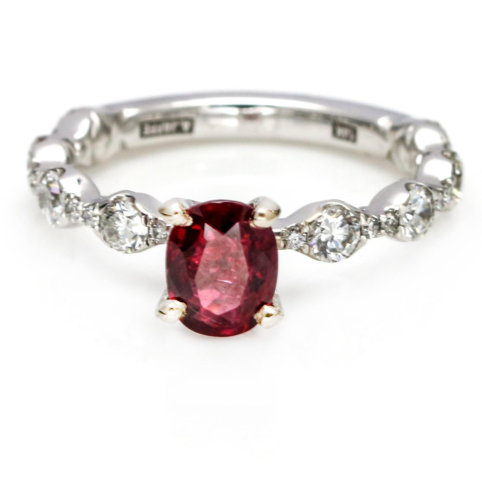 A. JAFFE 14-karat white gold classic engagement ring setting with oval-cut ruby center stone and diamonds on the sides. 

Size, 6.5 (can be resized).
Ruby carat weight, 1.15 carat
diamond carat weight, .72 carats
Ruby, 7 mm x 5 mm