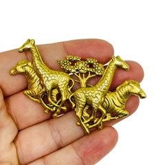 AJC broche vintage firmado en tono dorado de diseño safari cebra jirafa