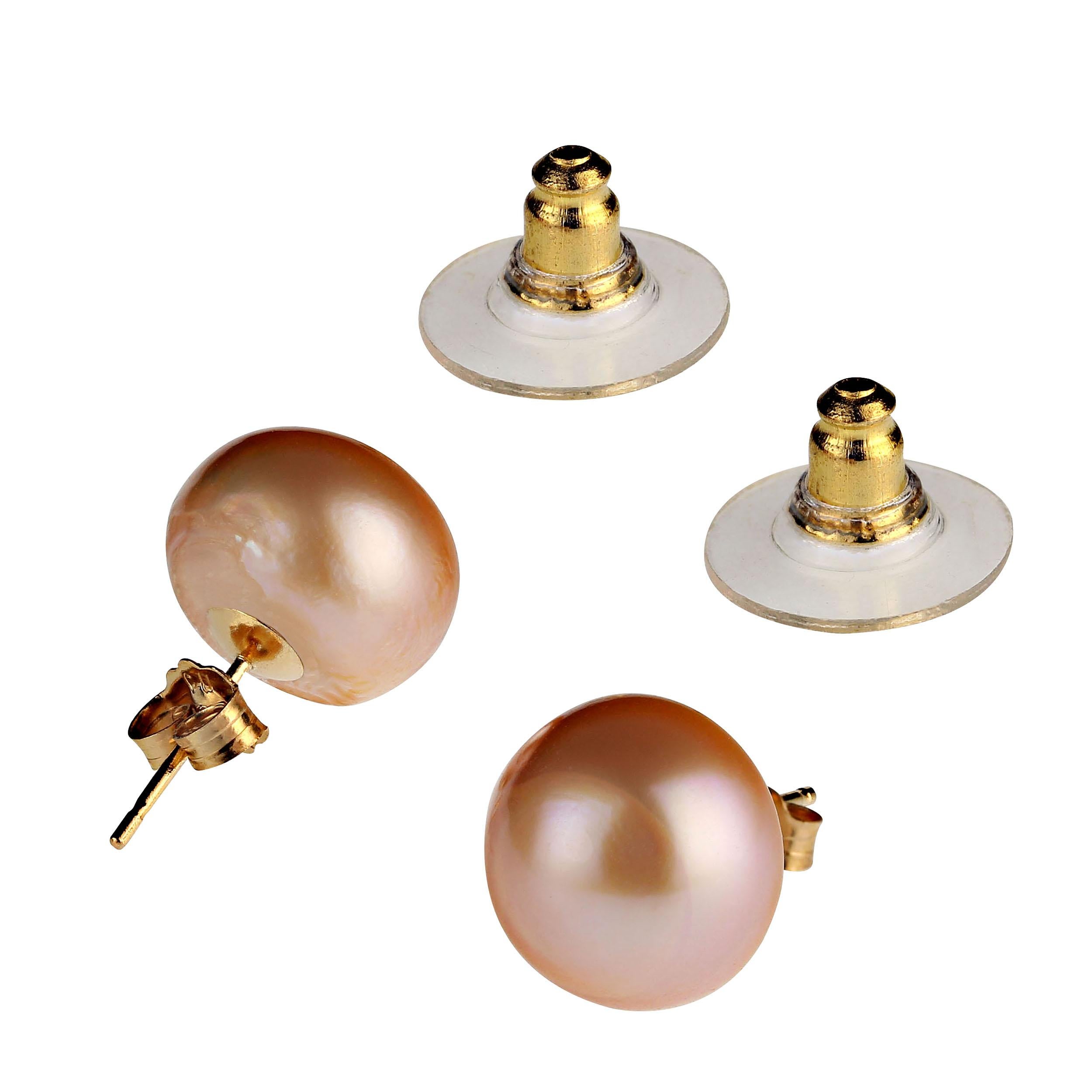 Your classic jewelry must have, lustrous, glowing 11MM Pearl Studs. These gorgeous studs are iridescent bronzy with 14k yellow gold posts, push backs, and cushion backs.  The cushion backs ensure comfort and keep the pearl secured properly on your