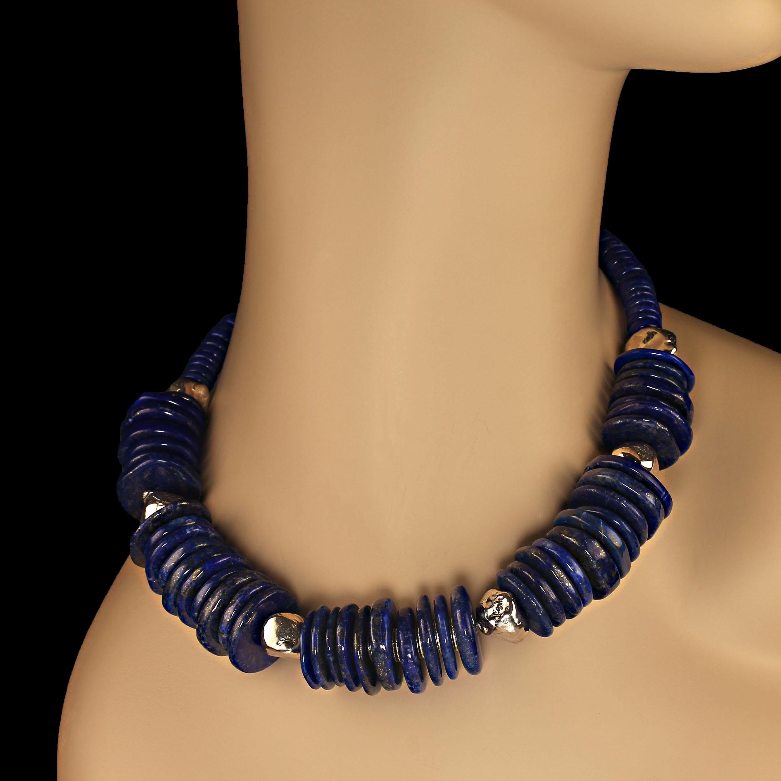 17 Inch Magnificent Lapis Lazuli and Sterling Silver Choker necklace. These large lapis lazuli, 20 mm, slices create a wide necklace such that the interior of it  is closer to 15 inches. This gorgeous necklace is secured with a large silver hook and