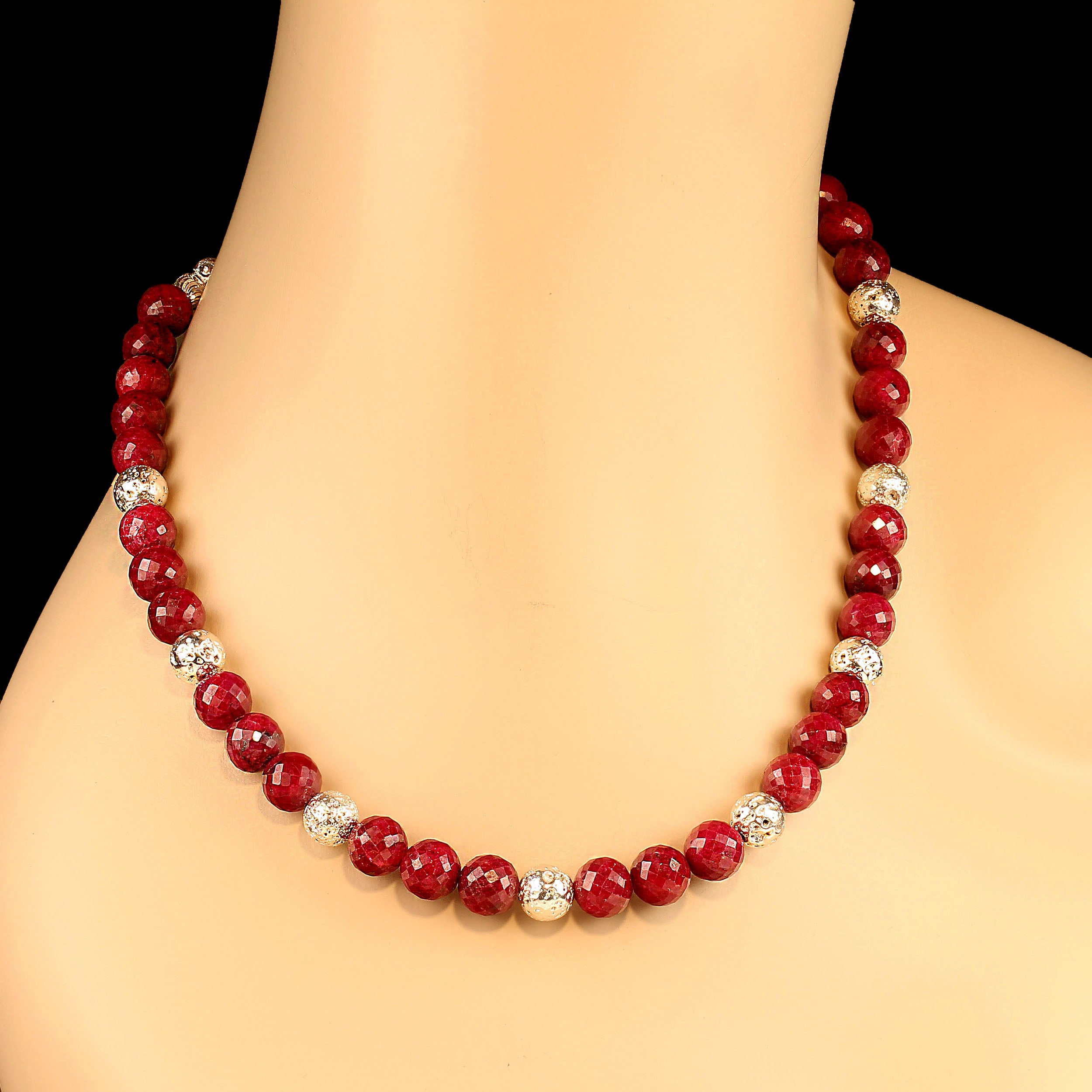 18-Inch Faceted Ruby Necklace with Silvery Lava Rock Accents - Antiqued Sterling Silver Lobster Clasp with Diamond Chips

Elevate your jewelry collection with this stunning 18-inch faceted ruby necklace, featuring deep, rich red opaque ruby