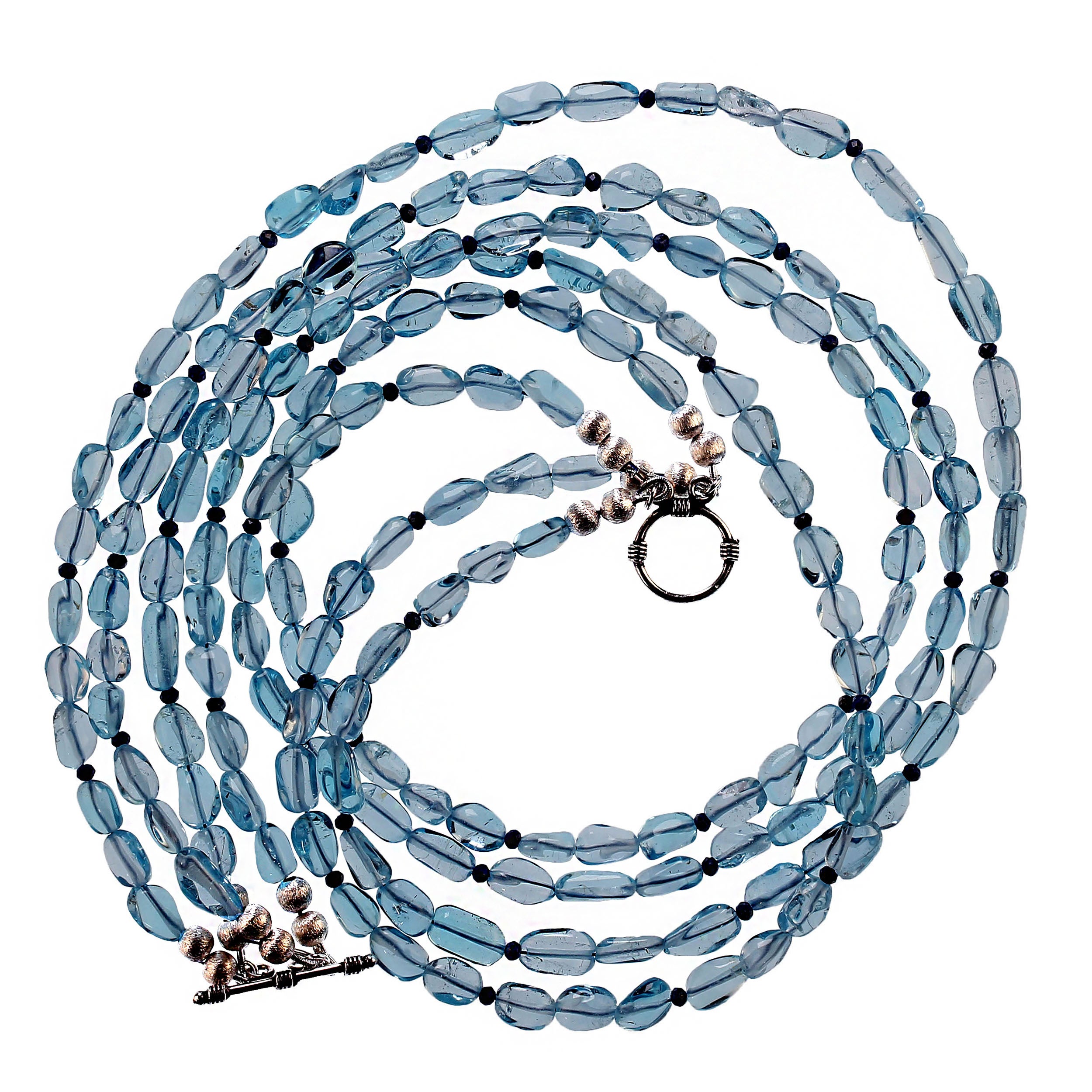 Introducing the 18-Inch Unique Sparkling Blue Topaz Nugget Necklace – a stunning accessory that beautifully combines the brilliance of blue topaz with the rich tones of lapis lazuli. This exquisite necklace features highly polished, sparkling blue