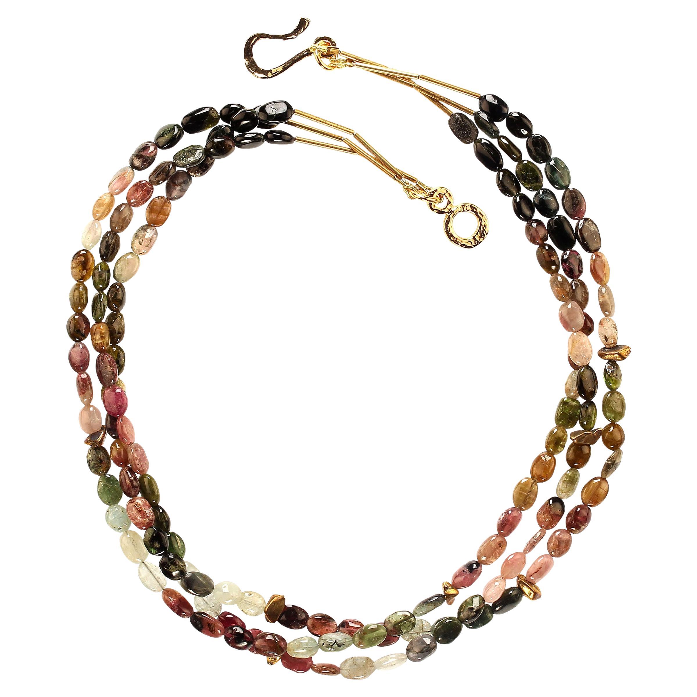 18 Inch necklace of smooth highly polished multi color tourmaline nuggets. Gold vermeil nuggets are featured accents among the nuggets.  These little beauties are approximately 7x5mm and are secured with a 14K gold vermeil hook and eye clasp.  MN2381