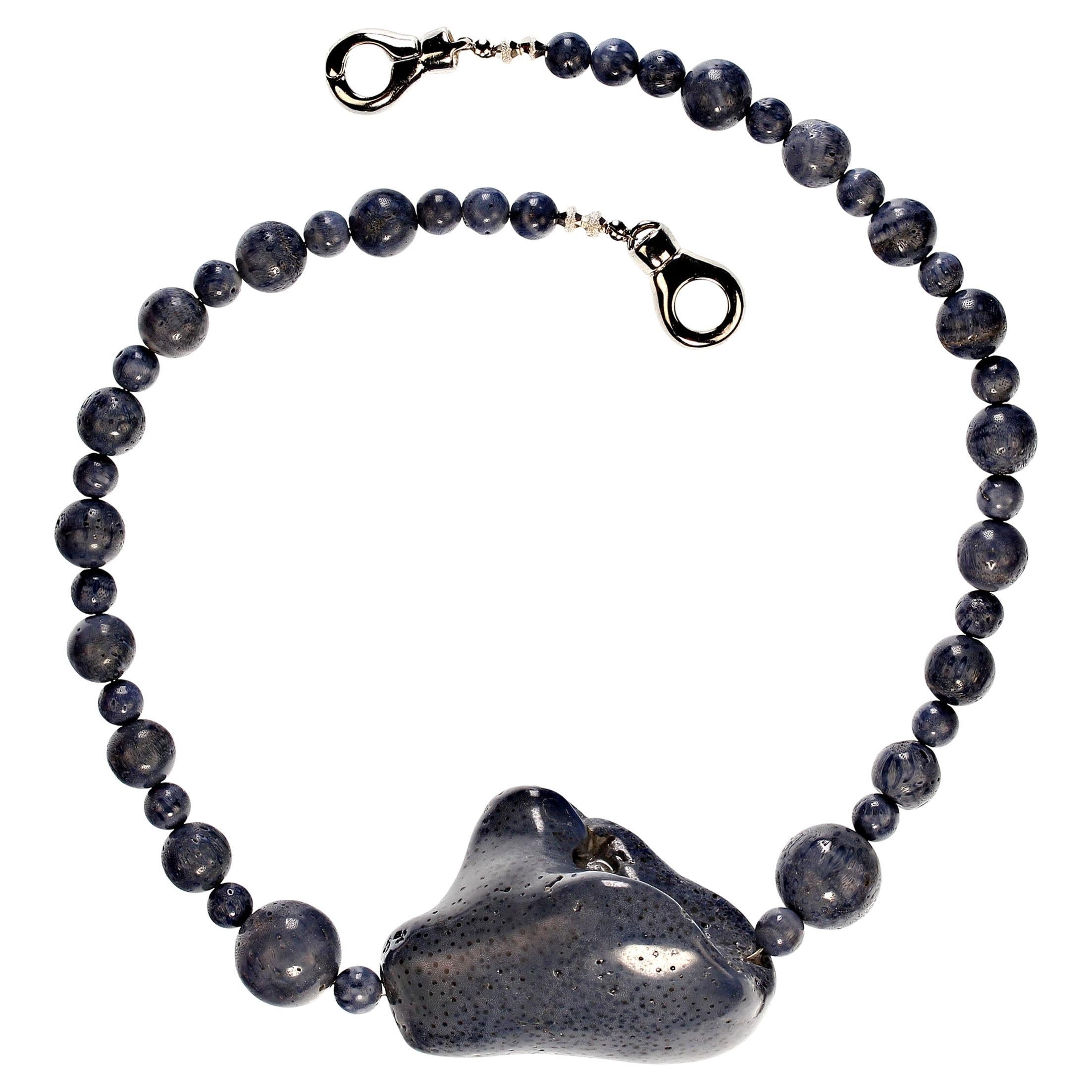 19 Inch unique blue coral necklace featuring a huge, 54x42mm, freeform center focal. This gorgeous focal is smooth on one side and sort of hollowed out on the other so it can be worn either way.  The necklace itself 8 and 10 mm blue coral. The