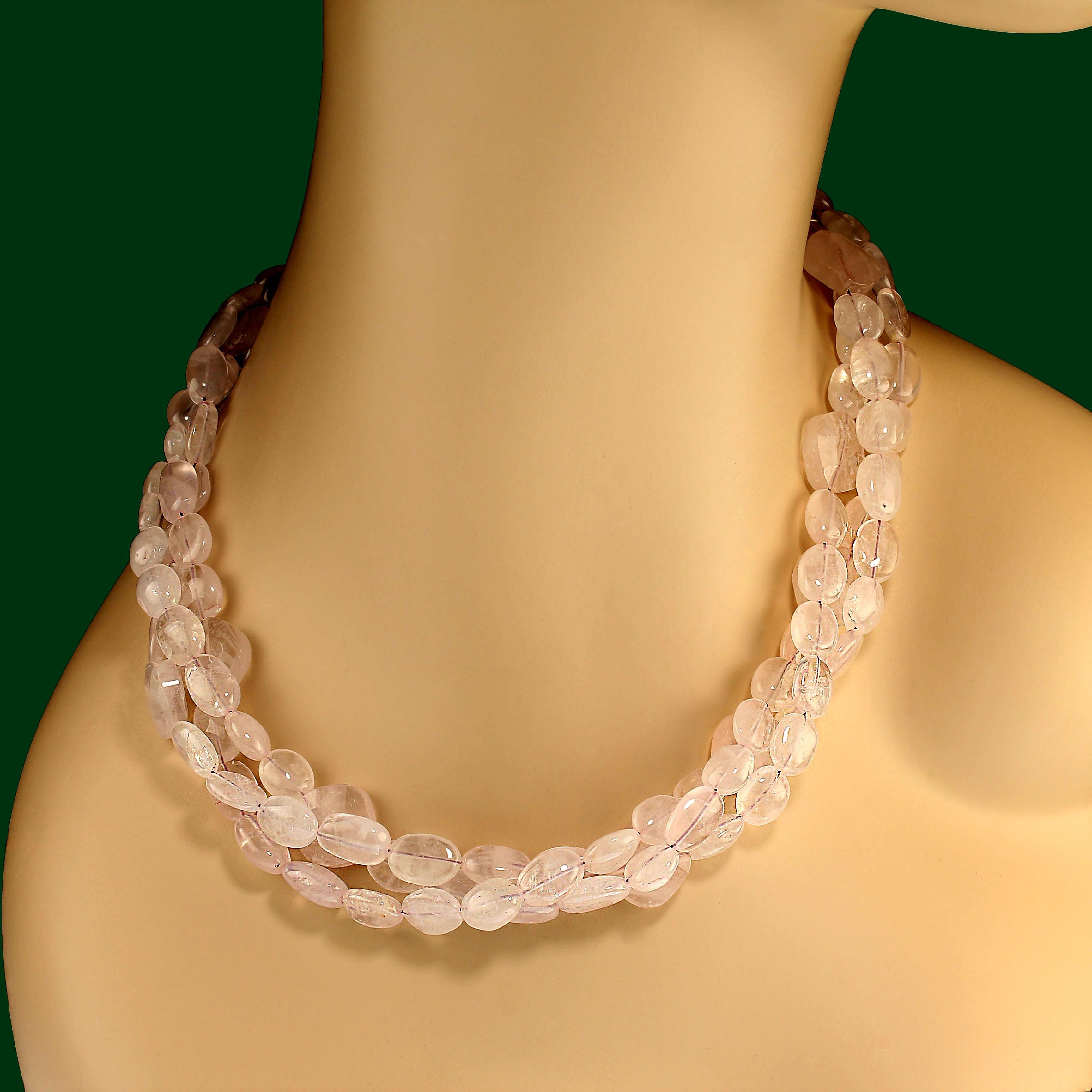Three strand Rose Quartz necklace which gracefully sits in your neck and glows.  These lovely gemstones create three strands of ovals with seven checkerboard squares for accents.  You can wear these three strands gently twisted to shorten and create