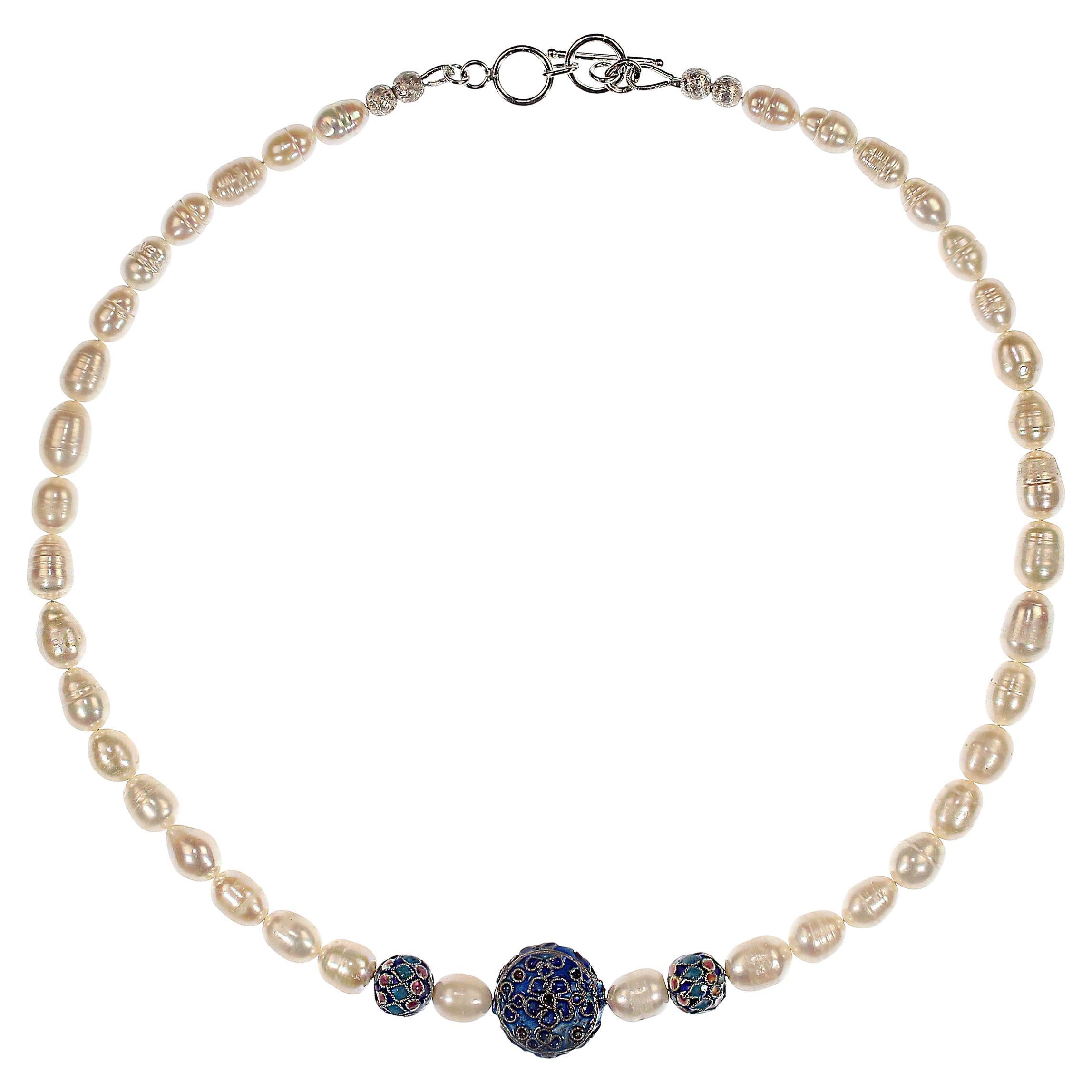 Elevate your jewelry collection with this enchanting 19-inch White Potato Pearl necklace, a piece that effortlessly blends timeless elegance with playful charm. Each lustrous pearl is carefully selected for its soft, organic shape and radiant sheen,