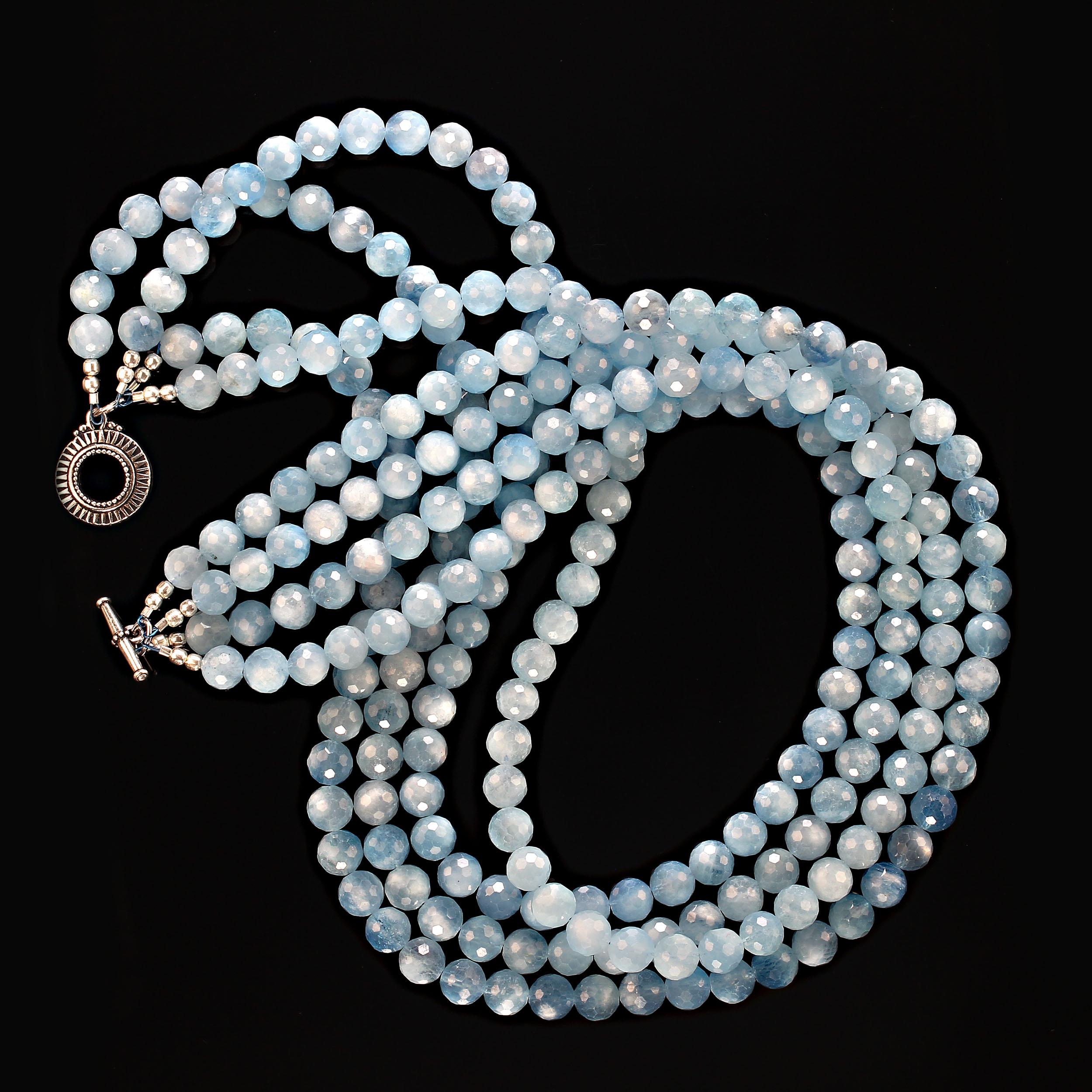 21 Inch Aquamarine necklace of four stands.  This gorgeous necklace features 8mm matte finished faceted aquamarines. The necklace can be worn with the strands lying flat upon each other or gently twisted. 
The necklace is secured with an easy-to-use