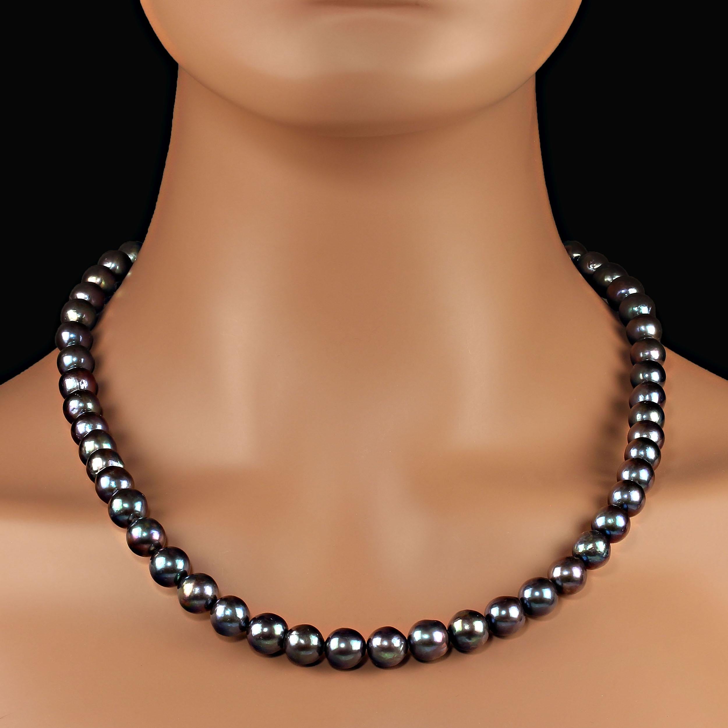 10MM Blue/Green Iridescent Pearl necklace with flashes of purple.  This 21-inch gorgeous pearl necklace is a delight to wear.  The necklace features a lobster claw clasp of antique sterling silver with diamond chips. MN2368
See the video for the