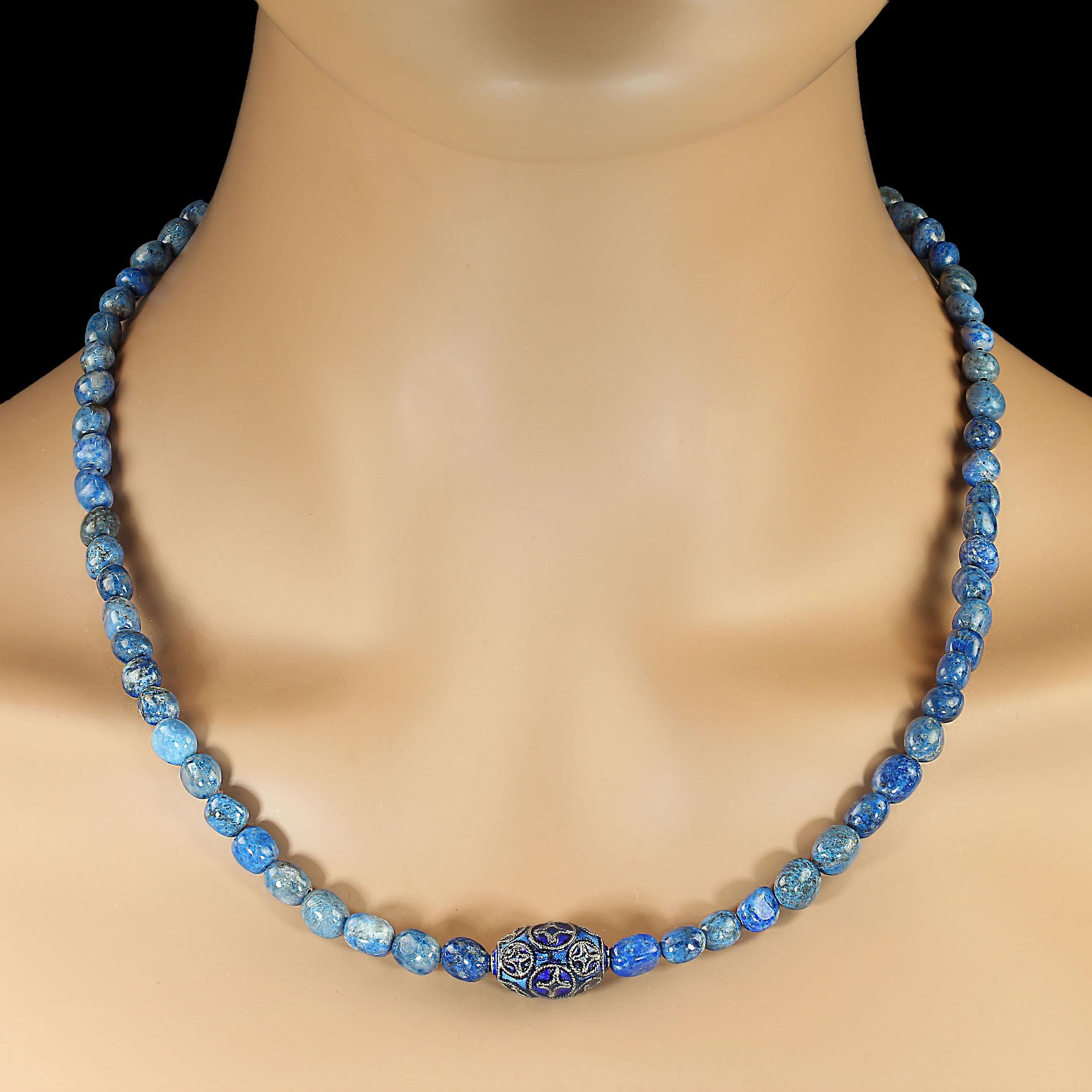 Elevate your style with this exquisite 21-inch necklace, handcrafted from rich, royal-blue Lapis Lazuli nuggets that shimmer with a high polish. Each stone is carefully selected for its depth of color and natural beauty, creating a striking yet