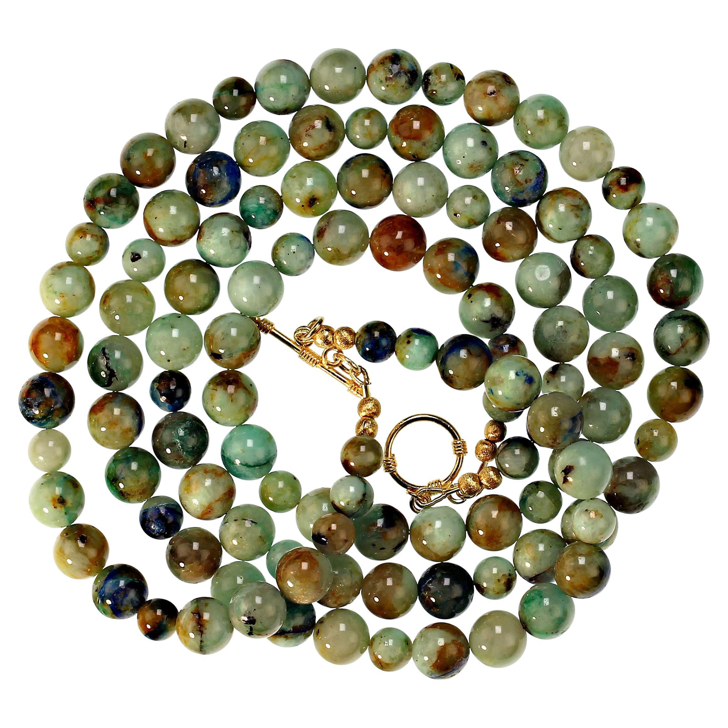 Gloriously green Chrysocolla and lots of other colors in this double strand 22 inch.  Green enhances everything.  Wear this gorgeous necklace with all your winter wardrobe.  The 10mm and 8mm beads feature shades of green, blue, brown, tan, and