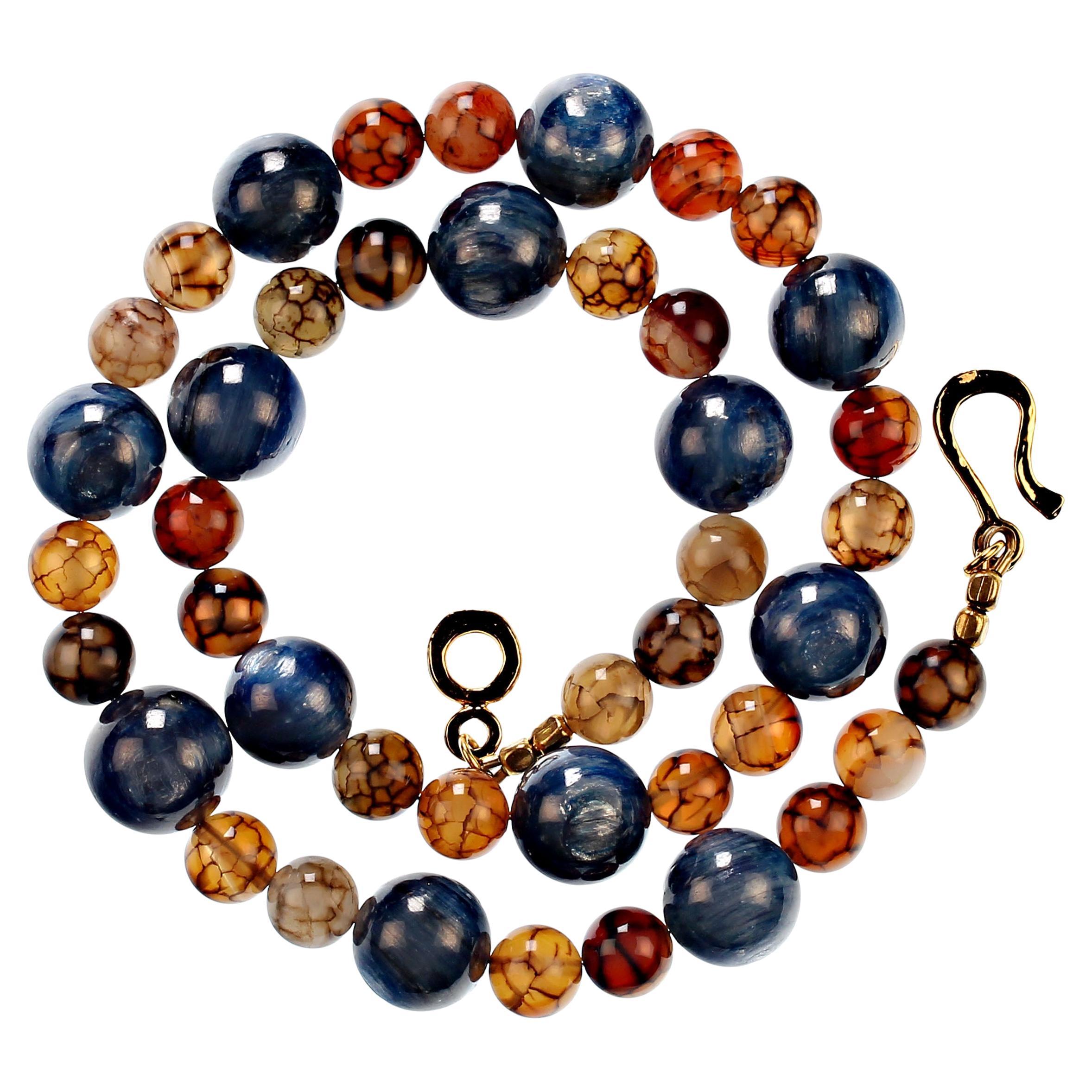 Fantastic necklace of chatoyant blue Kyanite and multi color Spiderweb Jasper.  This 22 inch  necklace is a delight to wear.  Blue and brown is a perfect combination especially in these highly polished gemstones. Wear this glowing necklace and